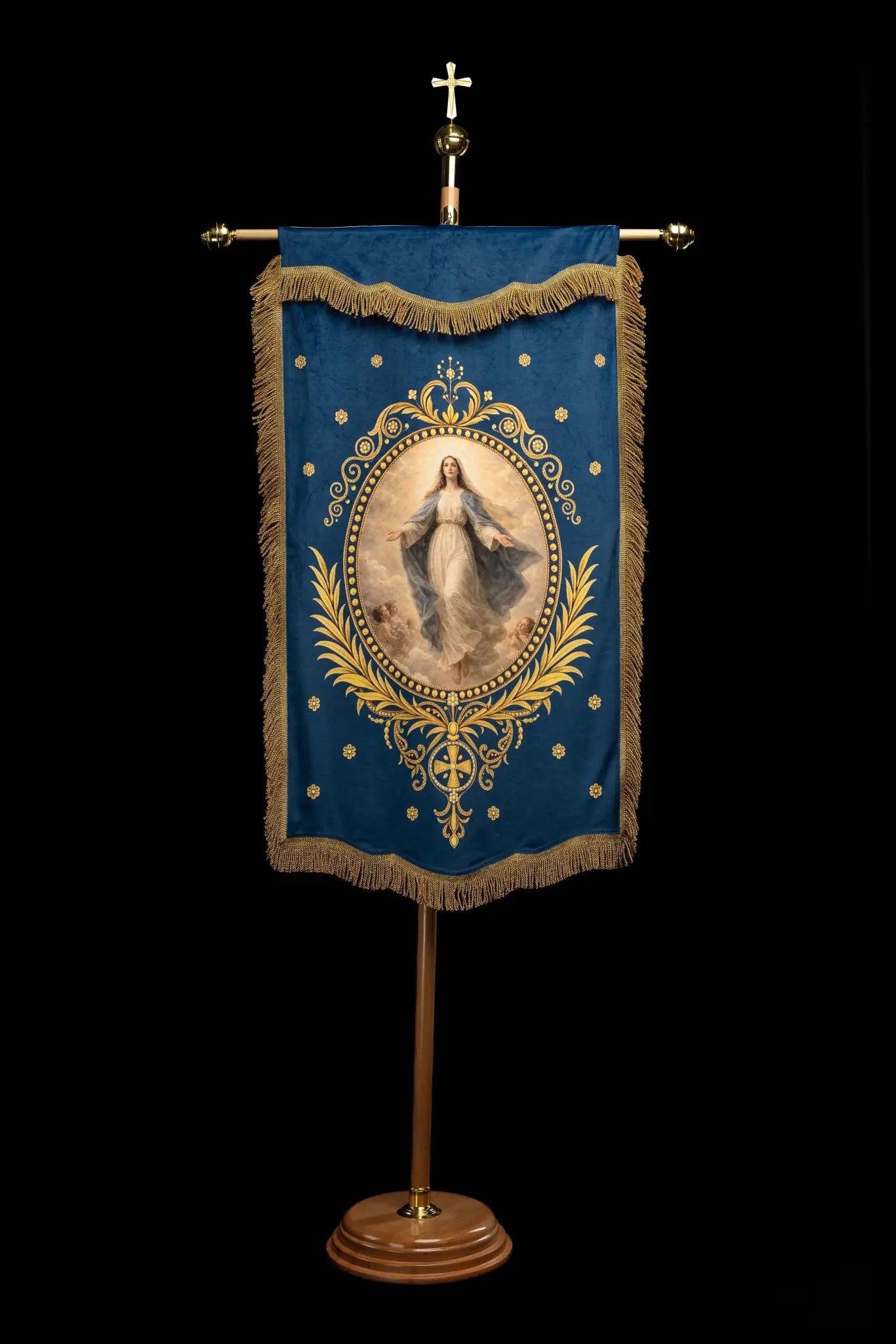 Double-sided processional banner with Our Lady of the Assumption on one side and a Marian monogram on the other, made of velour fabric with gold ornaments and fringes.