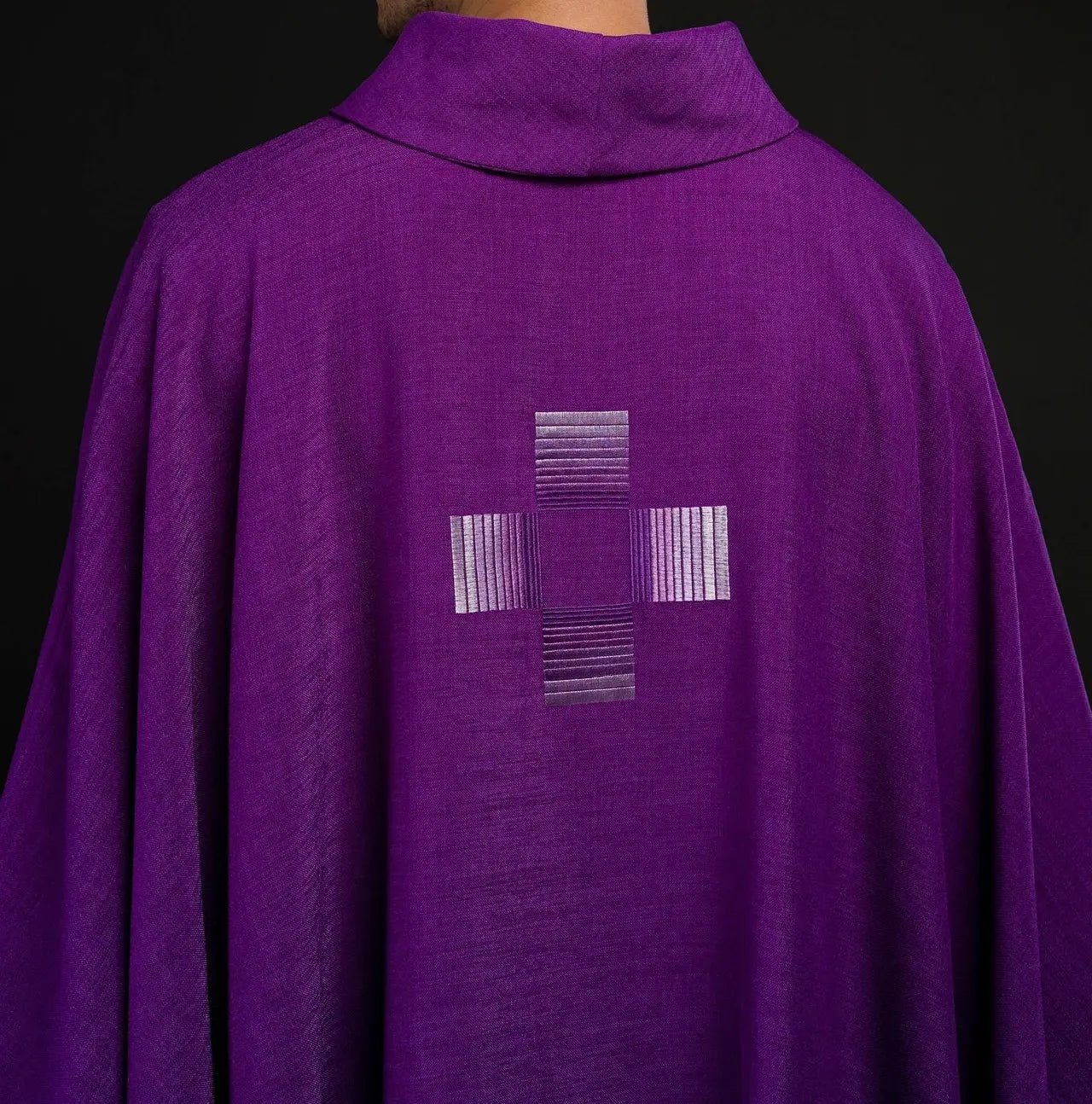 Purple chasuble with embroidered crosses
