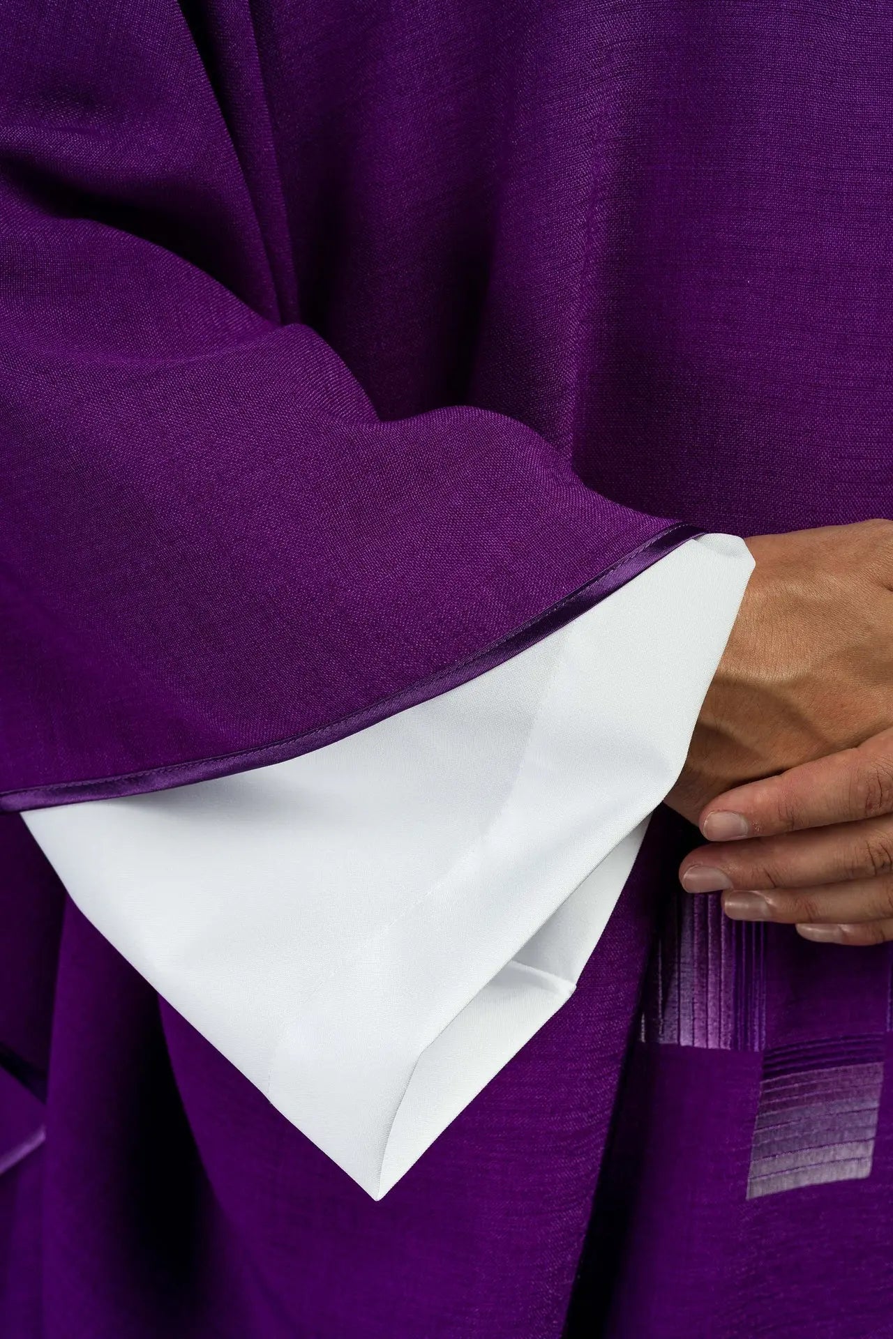 Purple chasuble with embroidered crosses