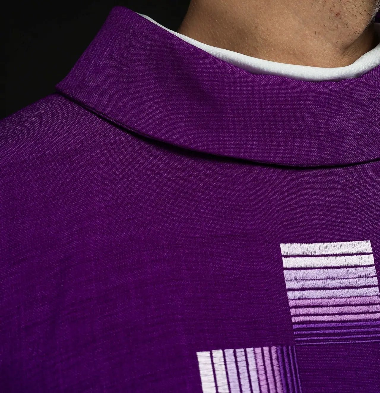 Purple chasuble with embroidered crosses