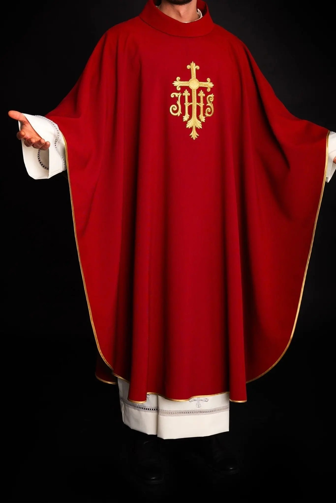 Embroidered red chasuble with JHS symbol