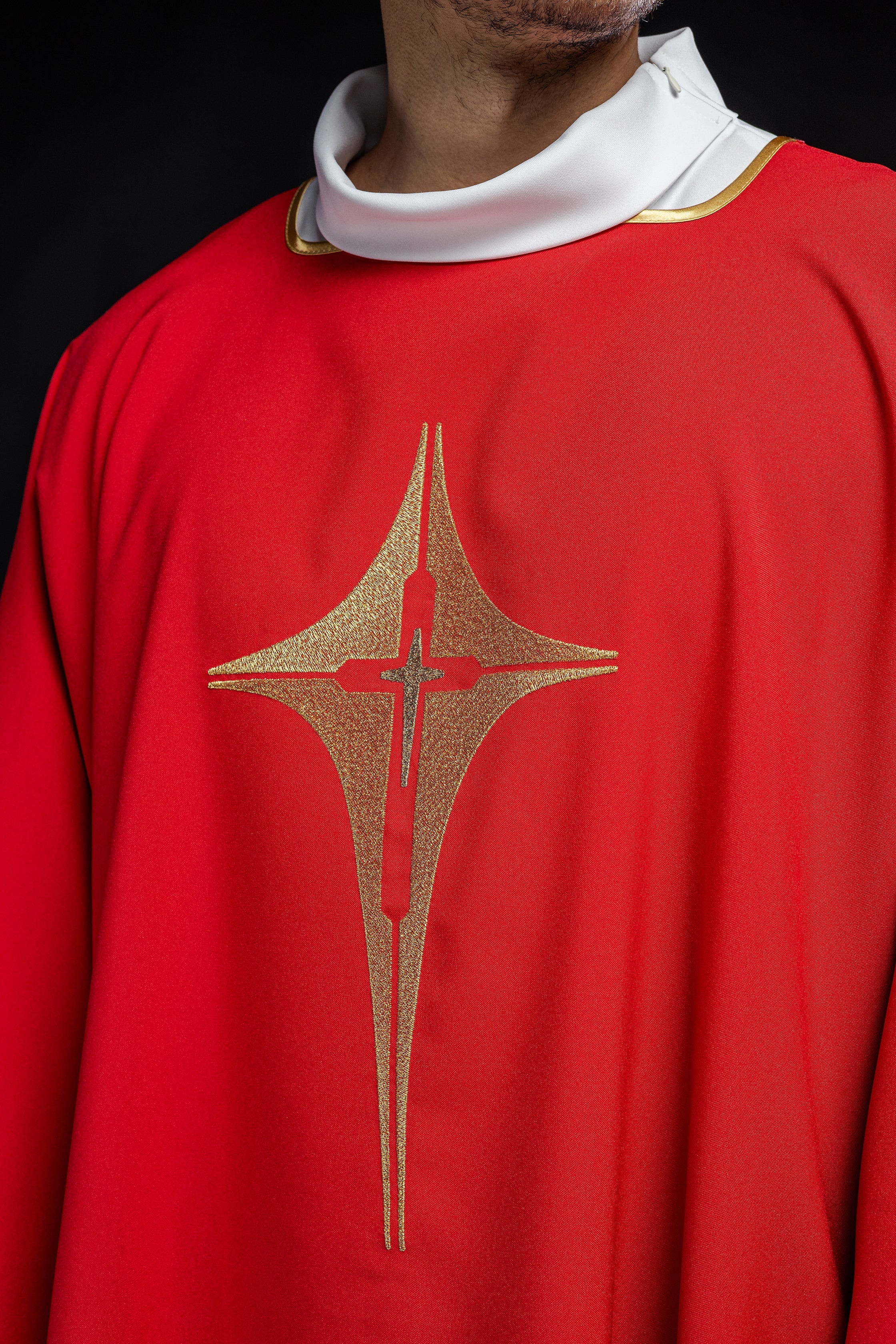 Red Dalmatia with embroidered gold cross