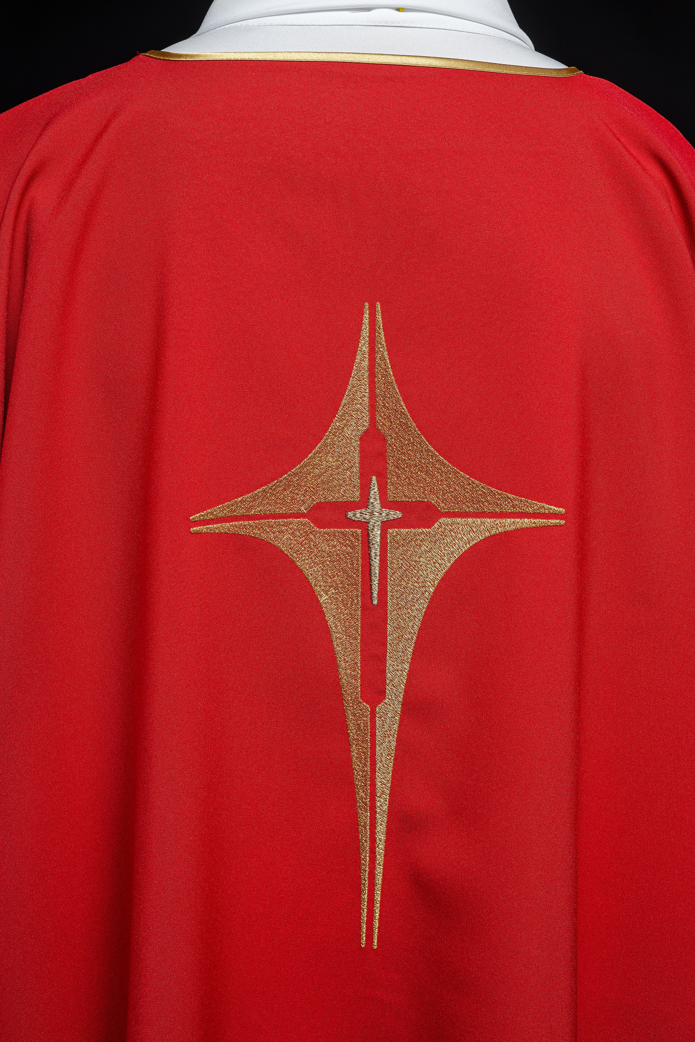 Red Dalmatia with embroidered gold cross