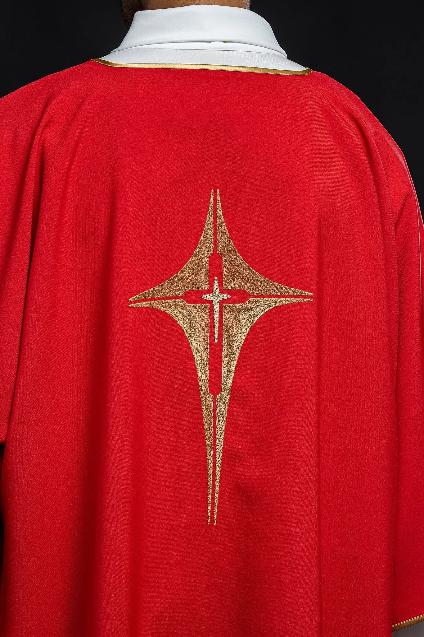 Red Dalmatia with embroidered gold cross