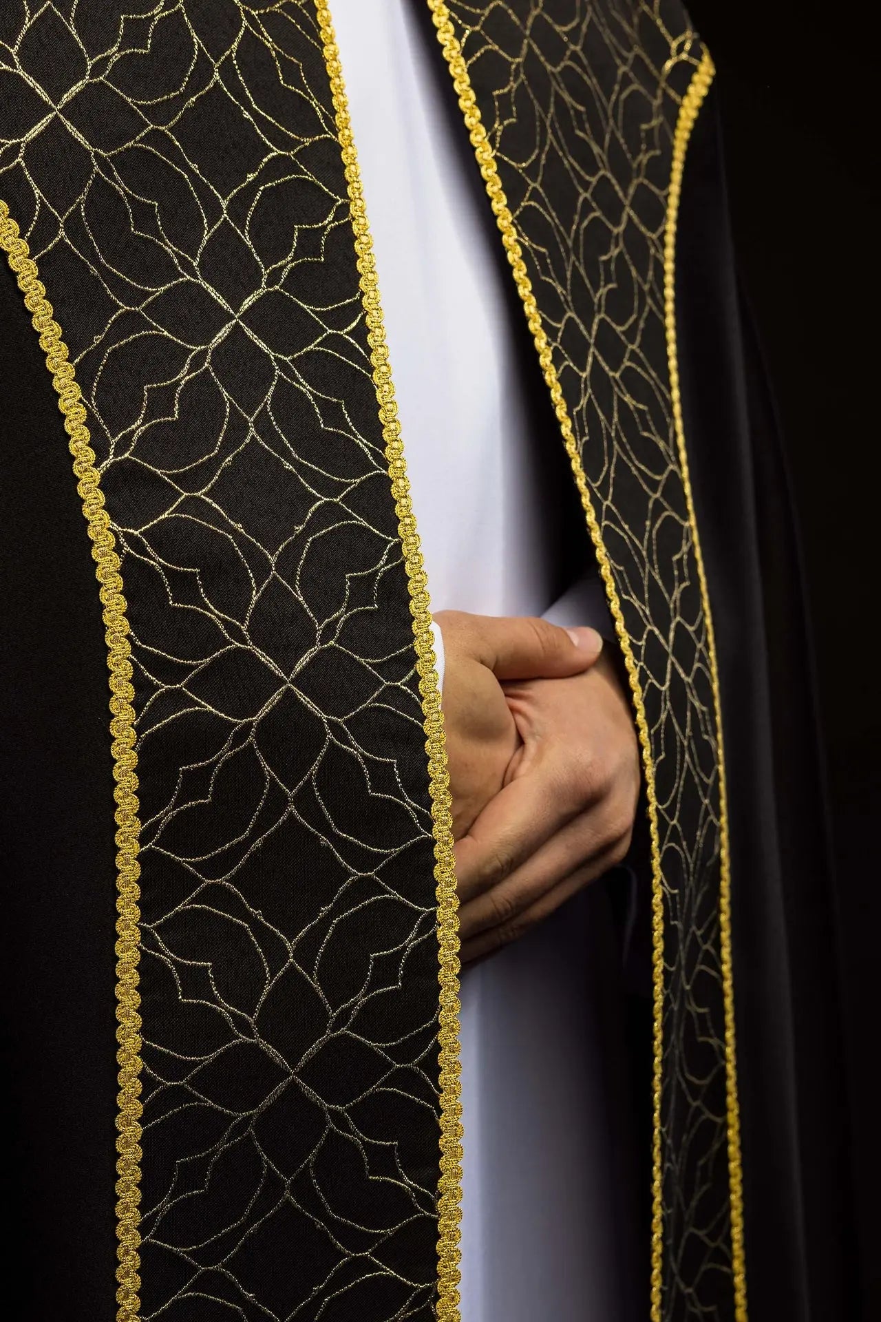 Embroidered black cope decorated with jacquard fabric