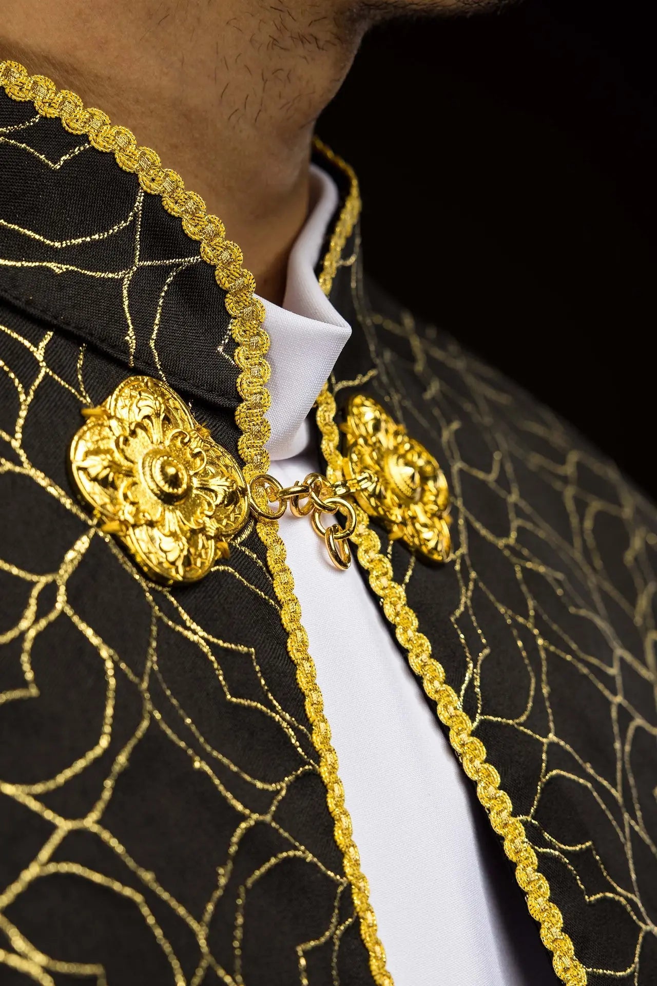 Embroidered black cope decorated with jacquard fabric