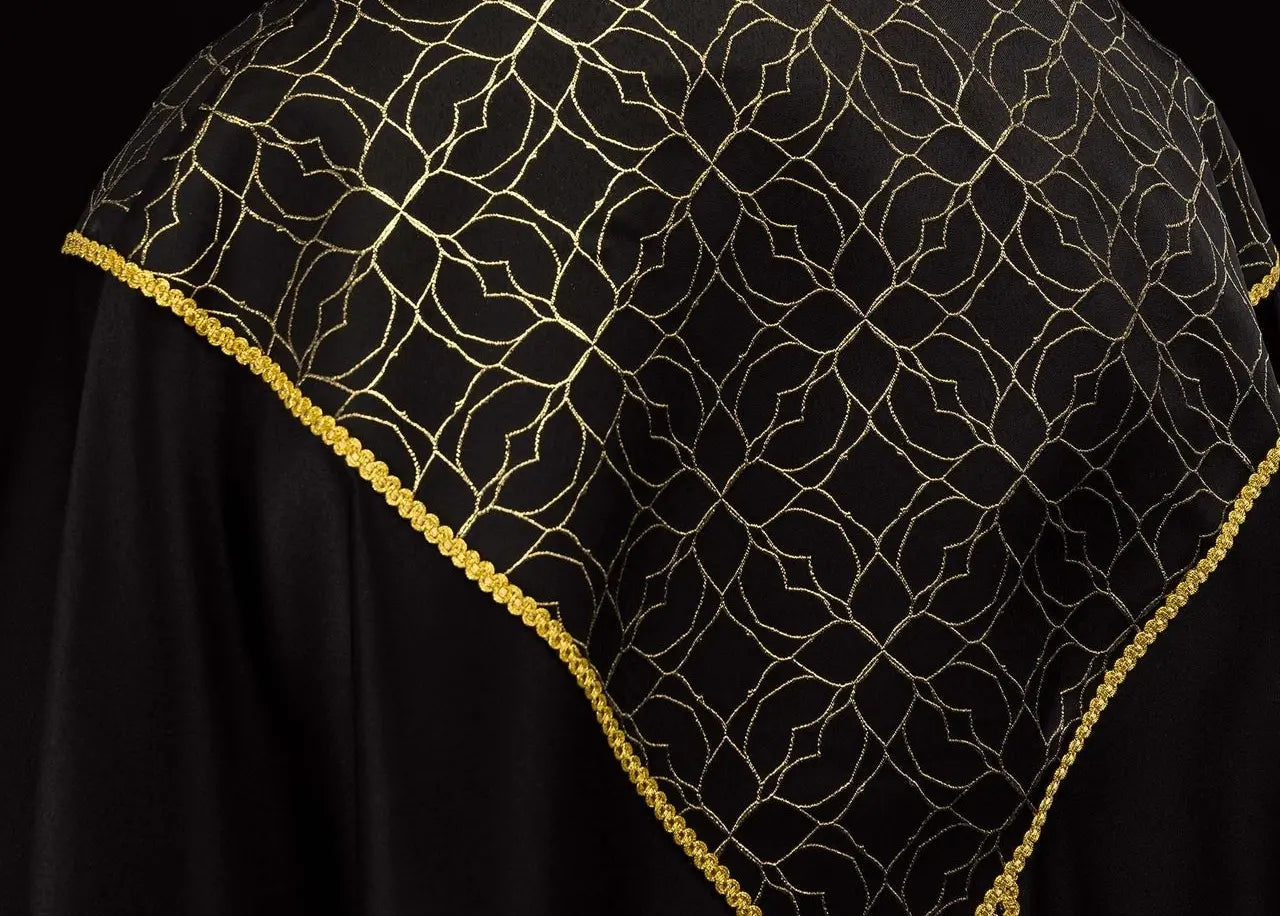Embroidered black cope decorated with jacquard fabric