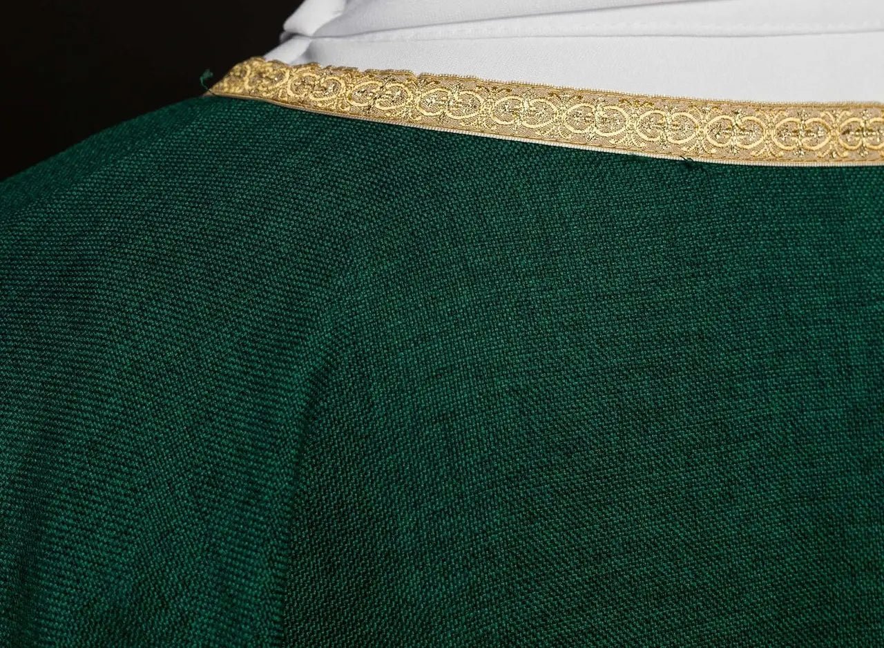 Green liturgical chasuble with a gold IHS embroidery