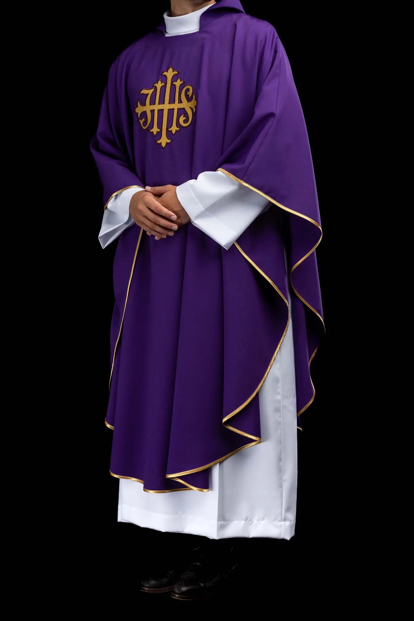 Purple chasuble with embroidered IHS symbol and gold trim, featuring a V-neckline and a matching stole.