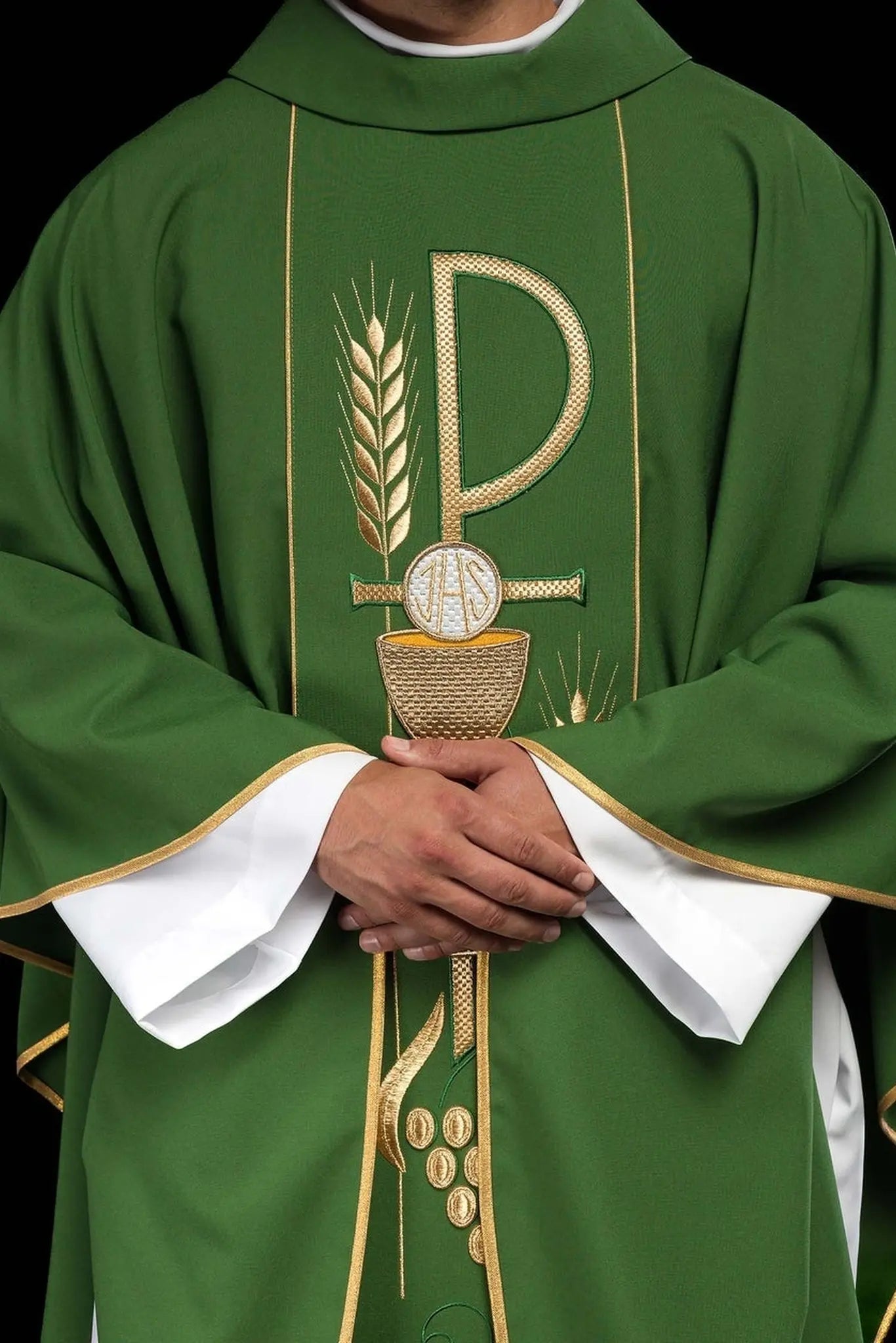 Green chasuble embroidered with IHS chalice design