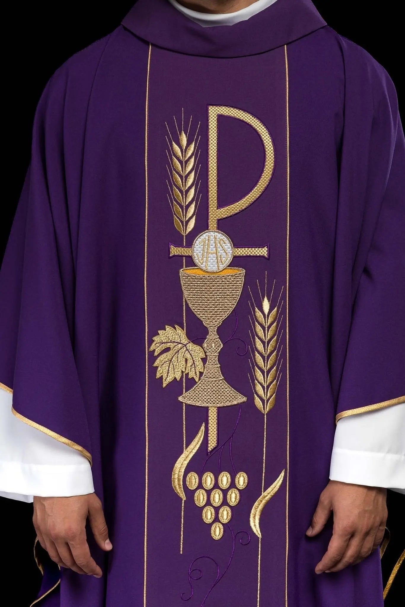 Purple chasuble embroidered with IHS chalice pattern