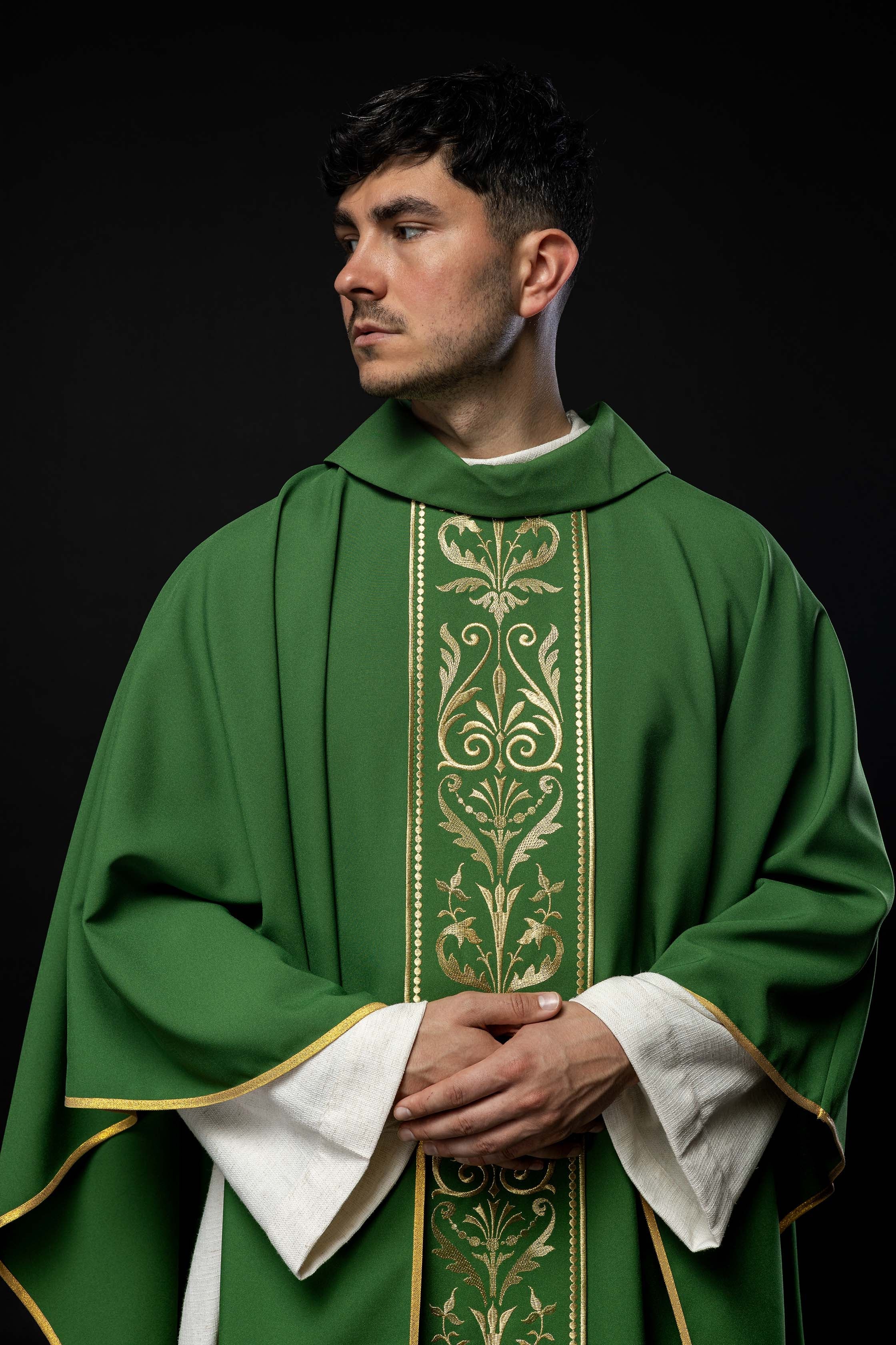 Green liturgical chasuble decorated with gold embroidered belt