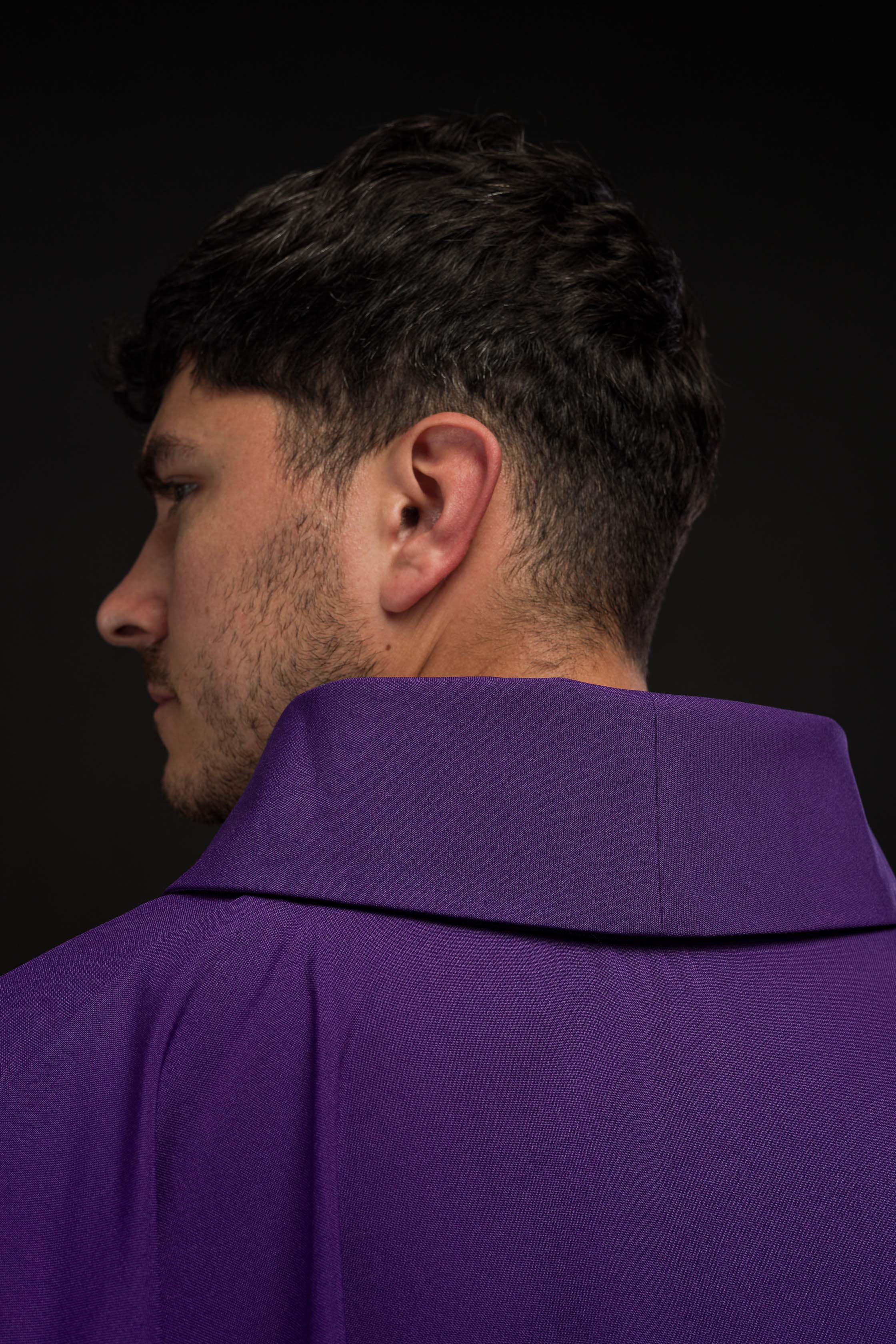 Purple chasuble with gold cross embroidery