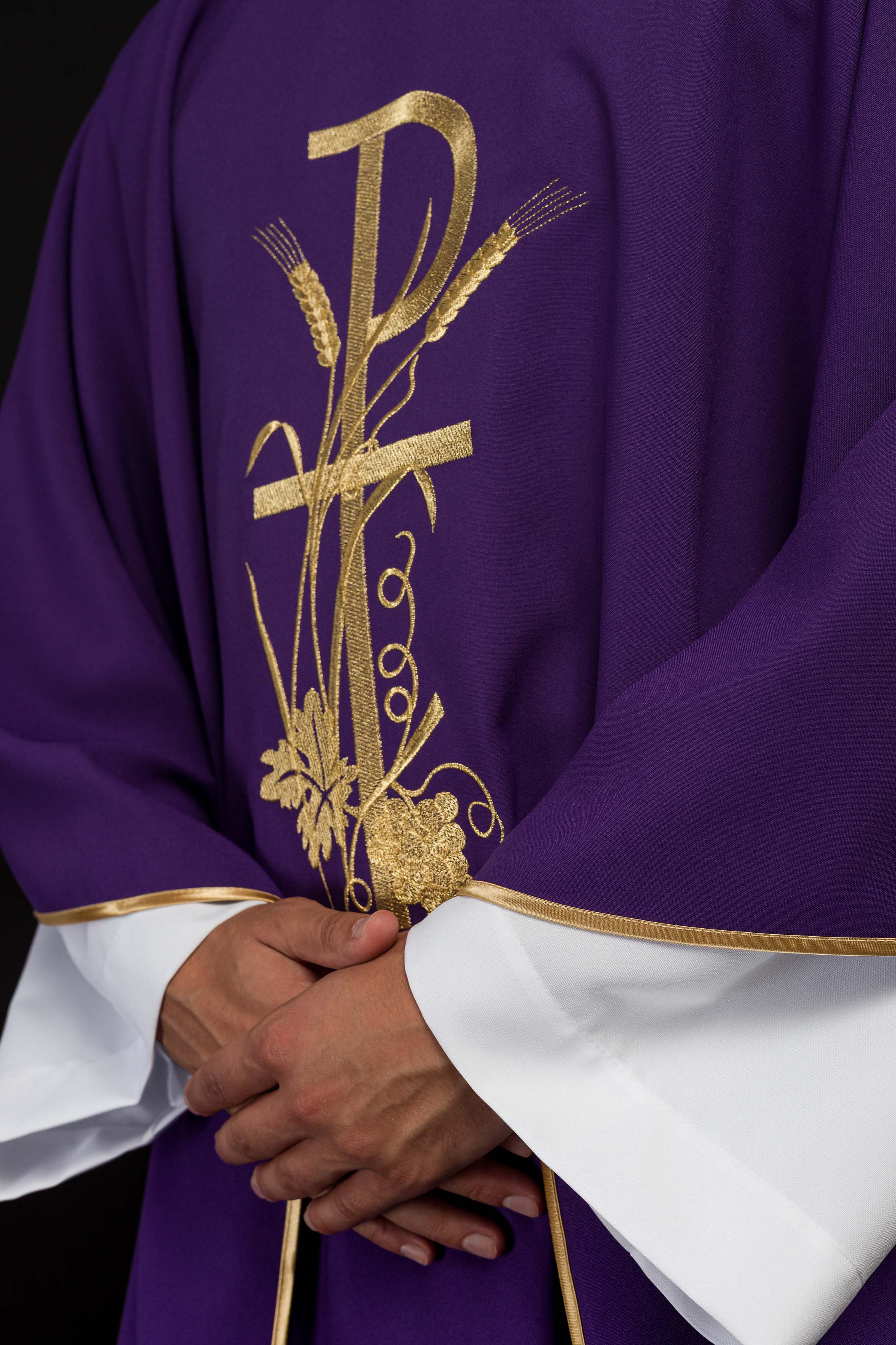 Purple chasuble with gold cross embroidery