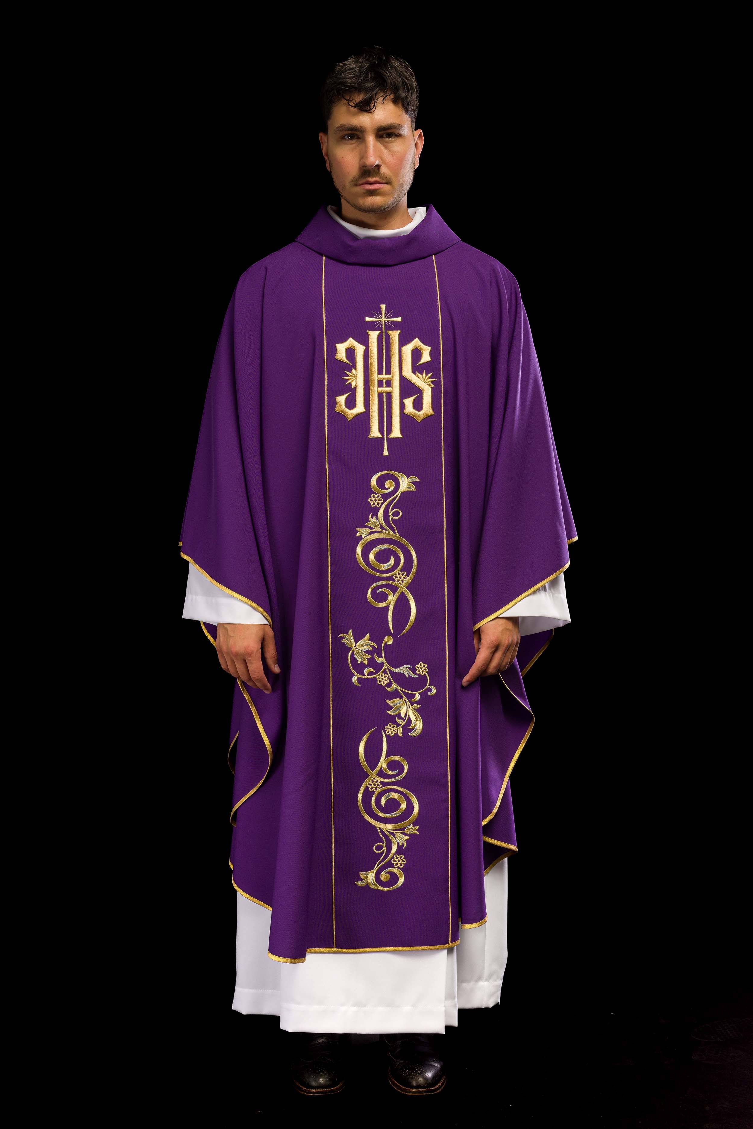 Richly decorated purple chasuble with gold motif and wide IHS band