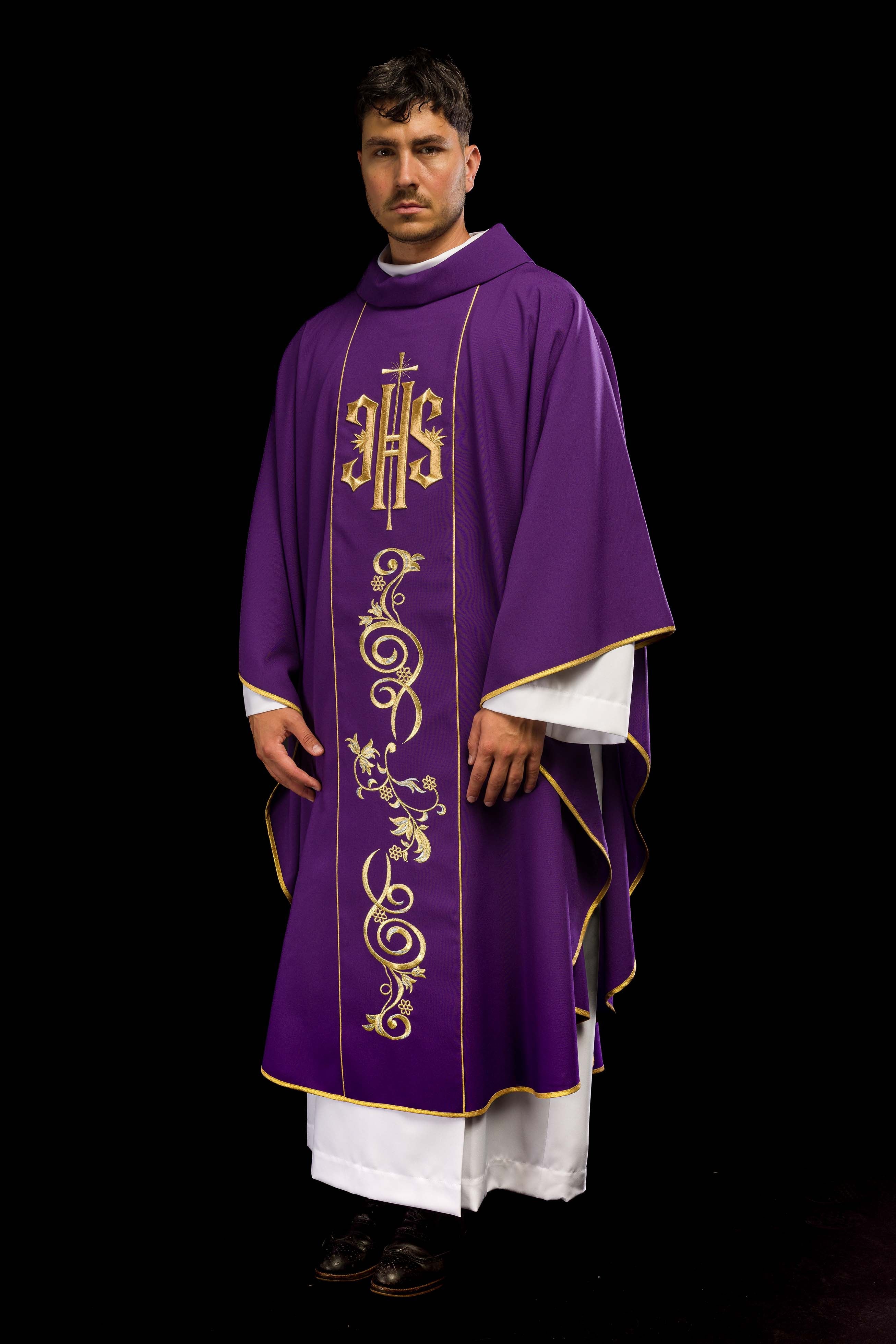 Richly decorated purple chasuble with gold motif and wide IHS band