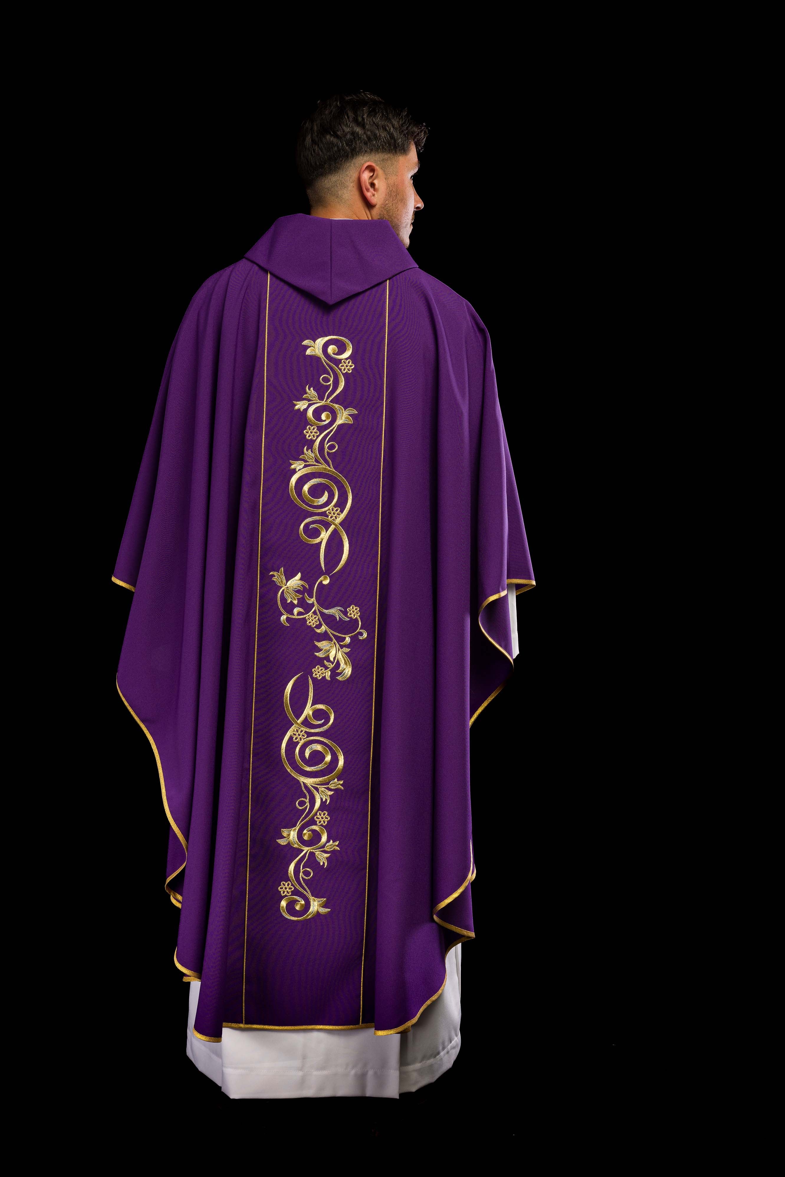 Richly decorated purple chasuble with gold motif and wide IHS band