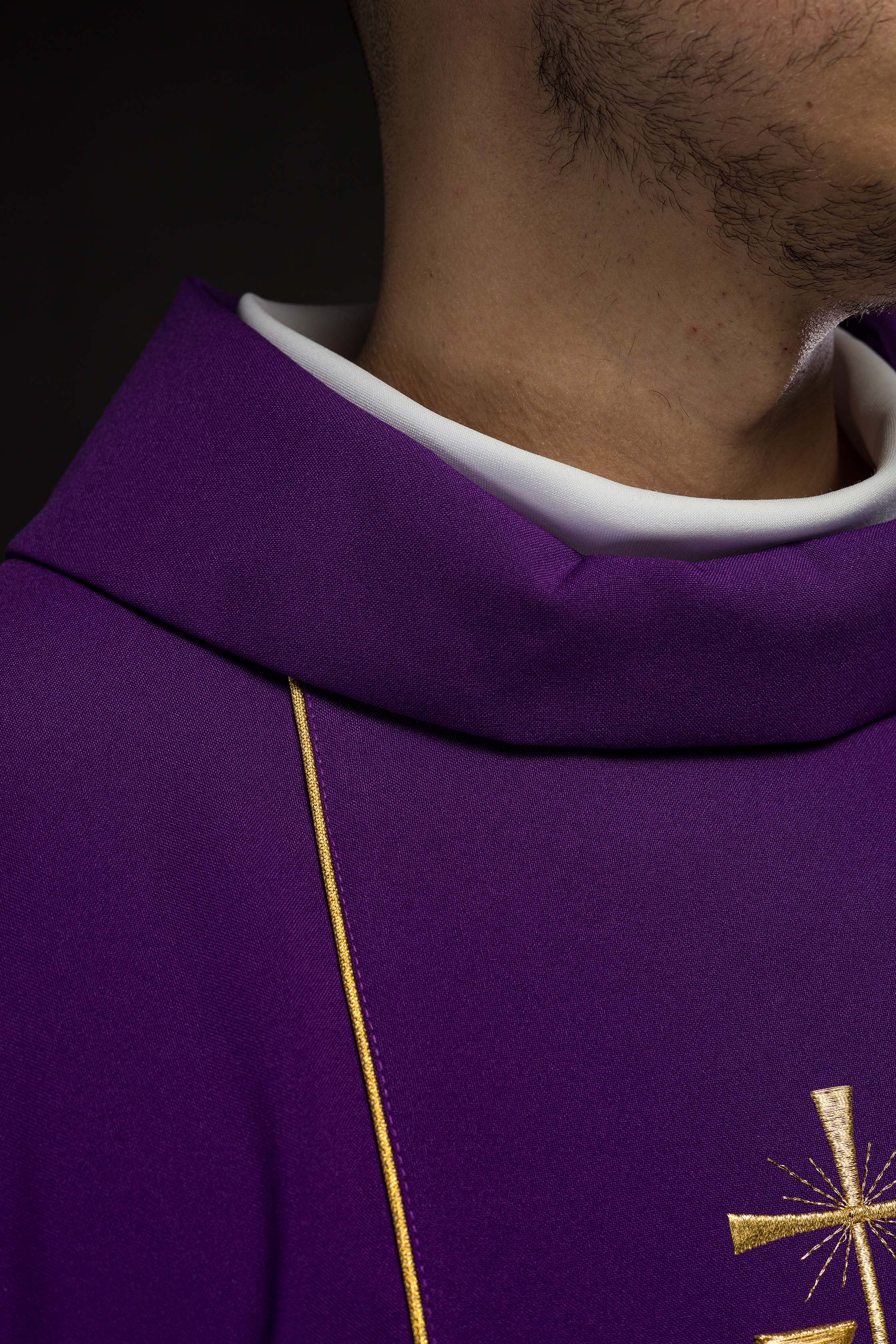 Richly decorated purple chasuble with gold motif and wide IHS band