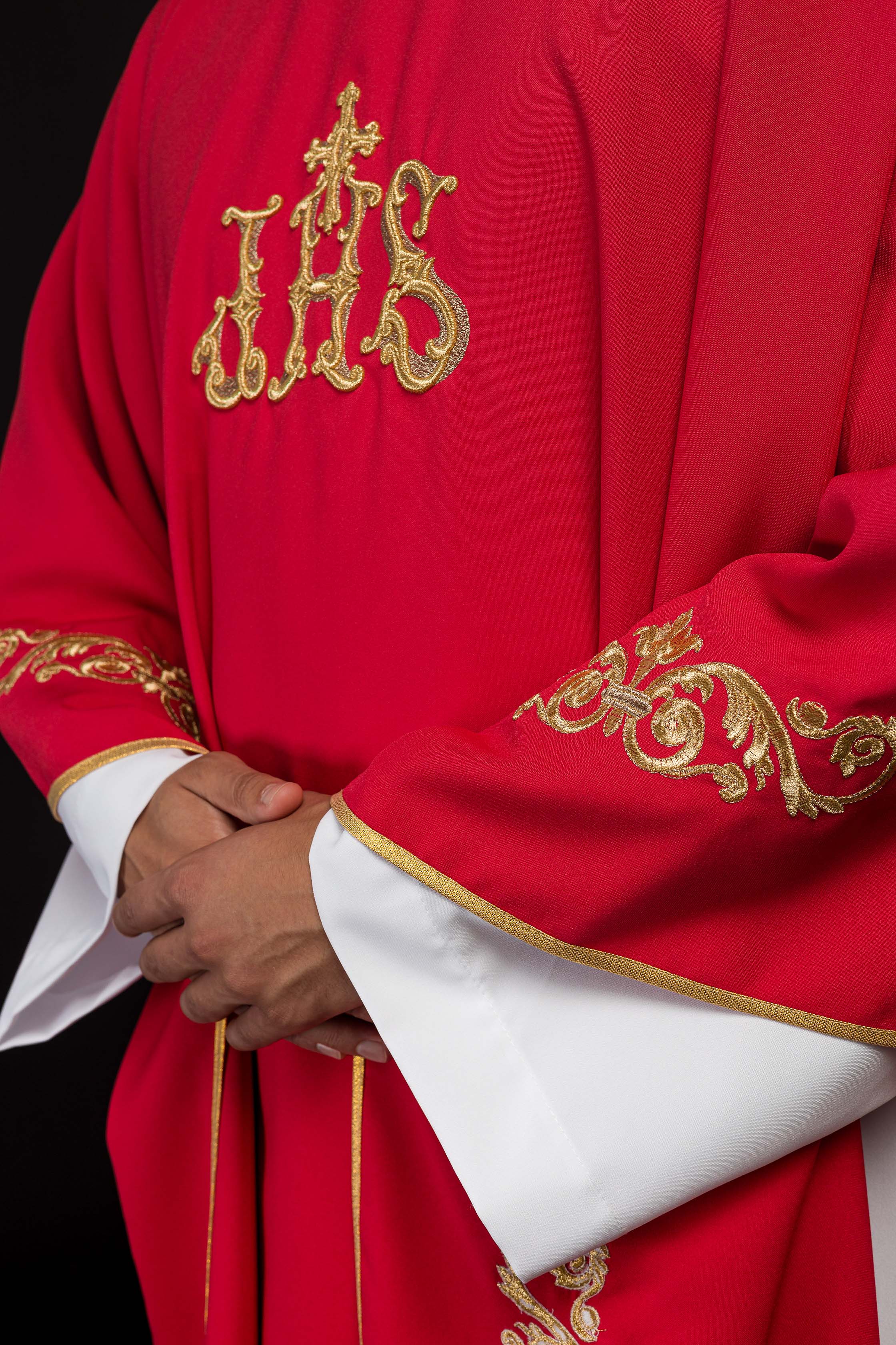 Red chasuble with gold IHS embroidery and decorative trim