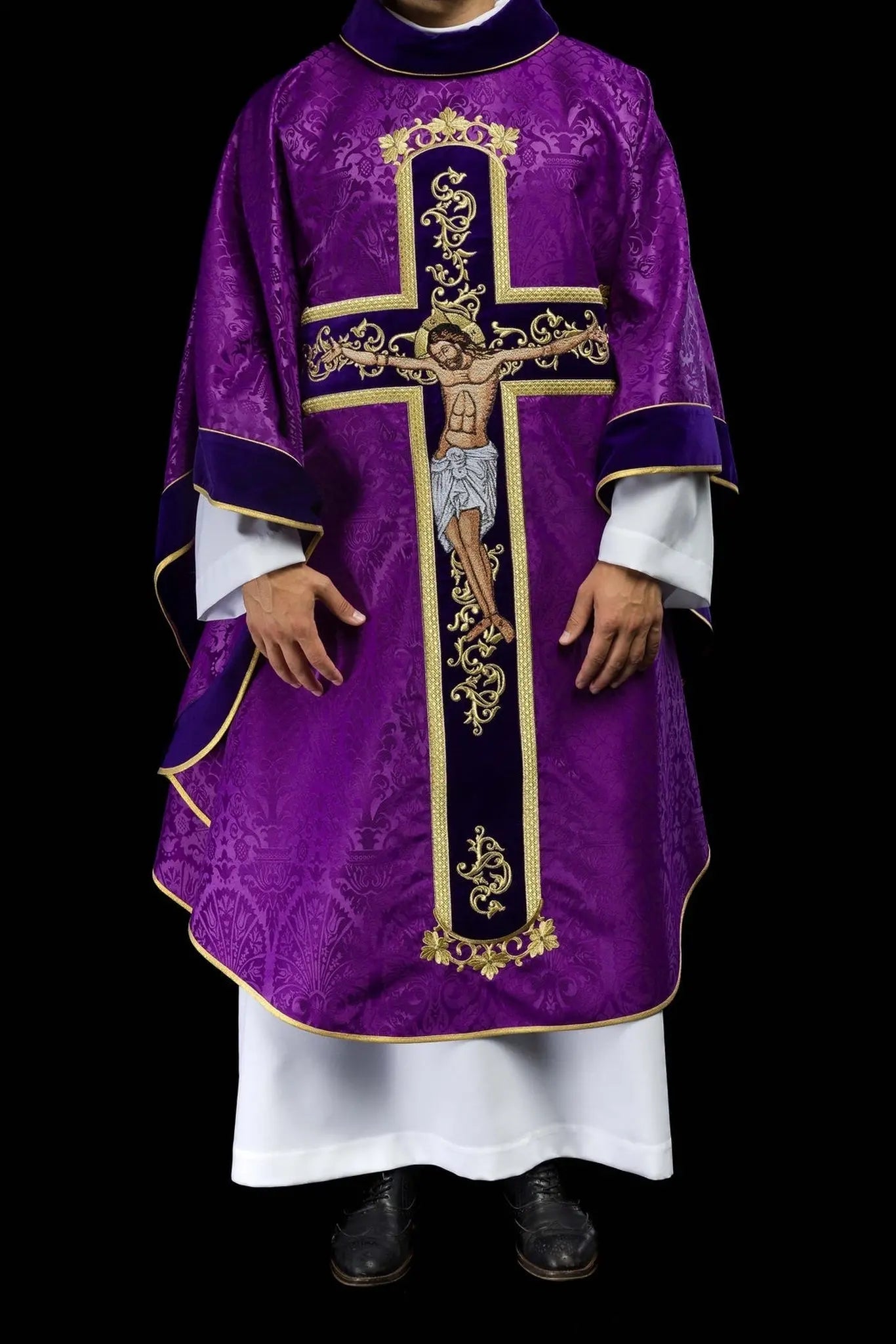 Purple chasuble embroidered with pattern of Jesus Christ
