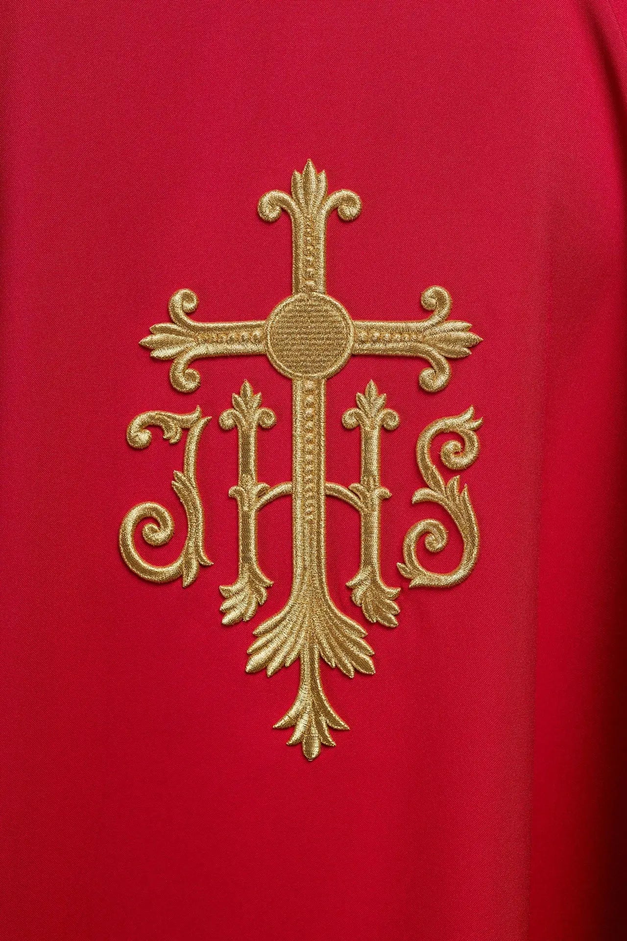 Embroidered red chasuble with JHS symbol