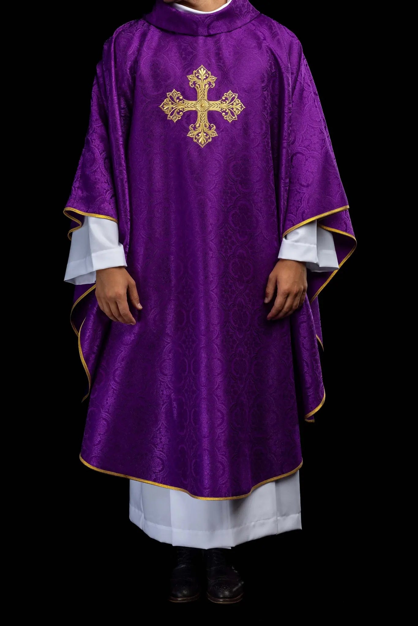 Purple chasuble with a gold embroidered cross on jacquard fabric, featuring a stand-up collar and gold trim.