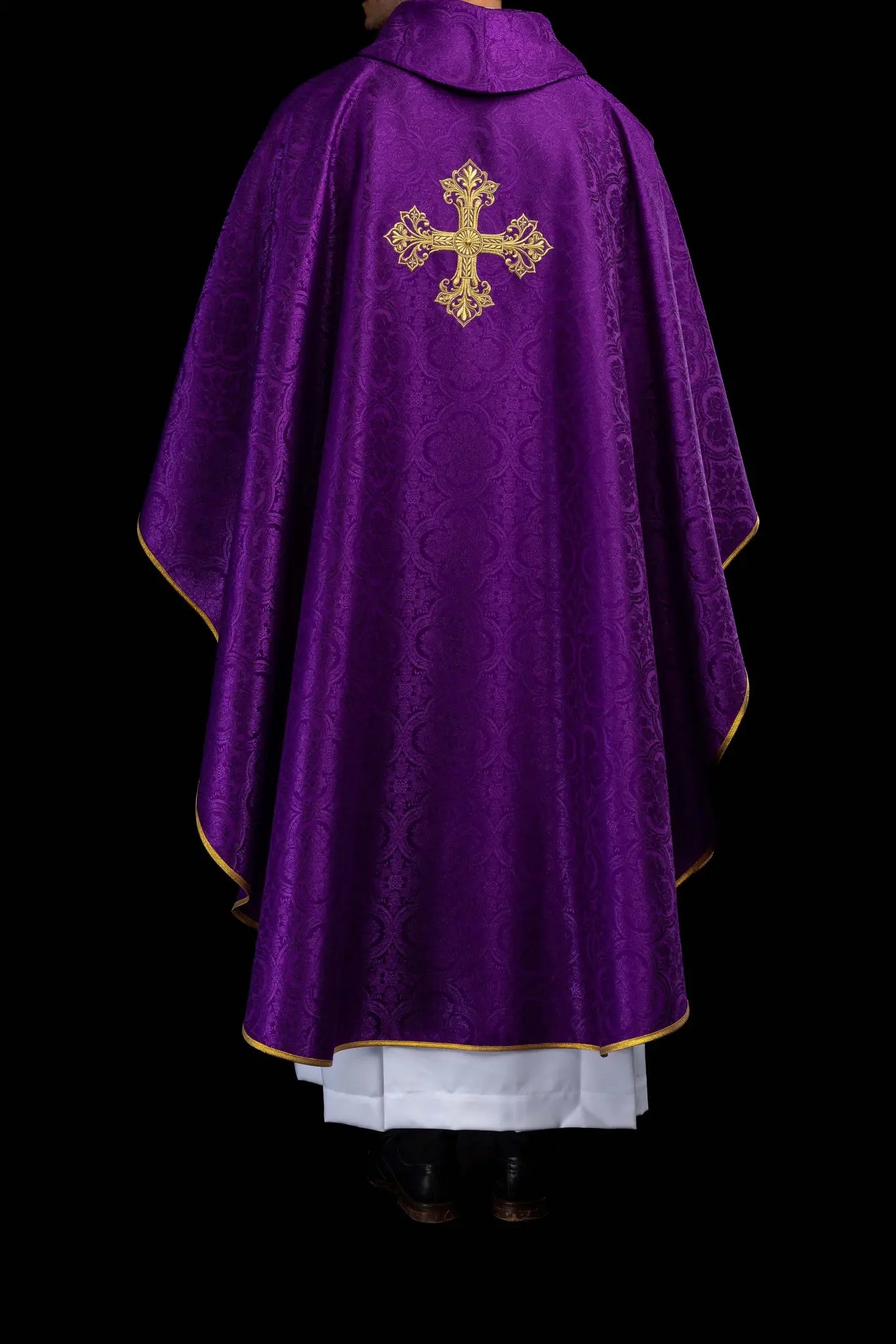Purple chasuble with a gold embroidered cross on jacquard fabric, featuring a stand-up collar and gold trim.