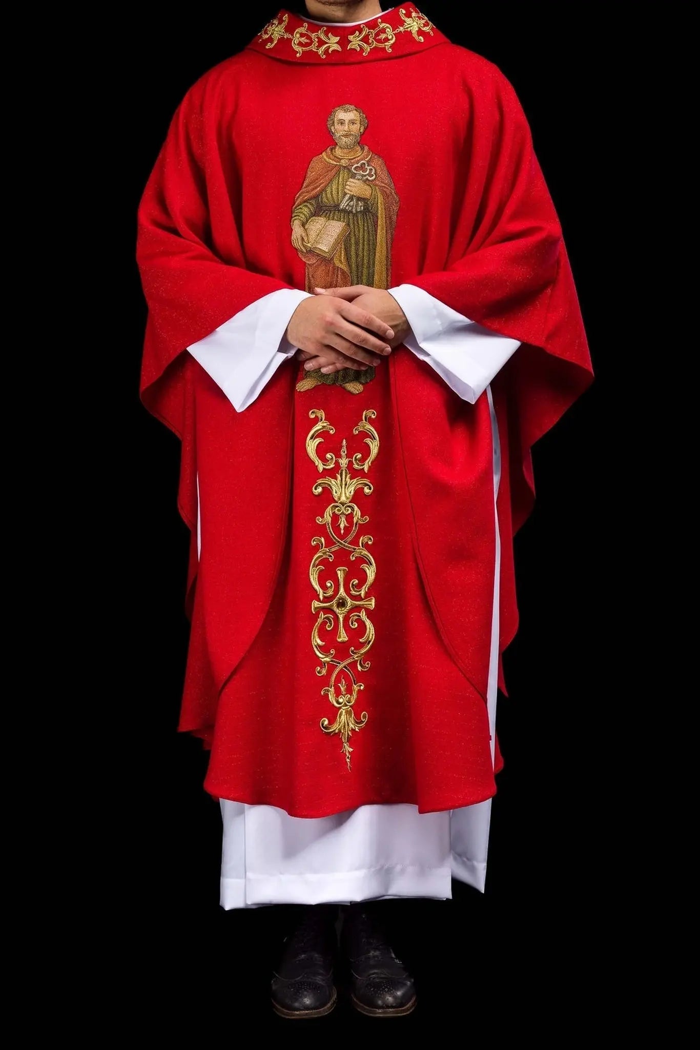 Richly embroidered chasuble with the image of Saint Peter red