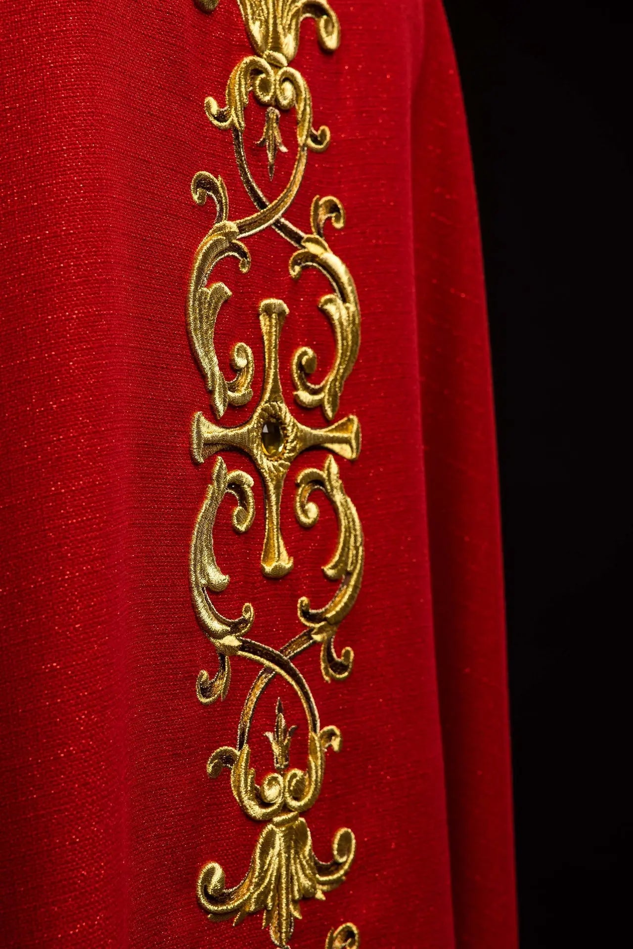 Richly embroidered chasuble with the image of Saint Paul red