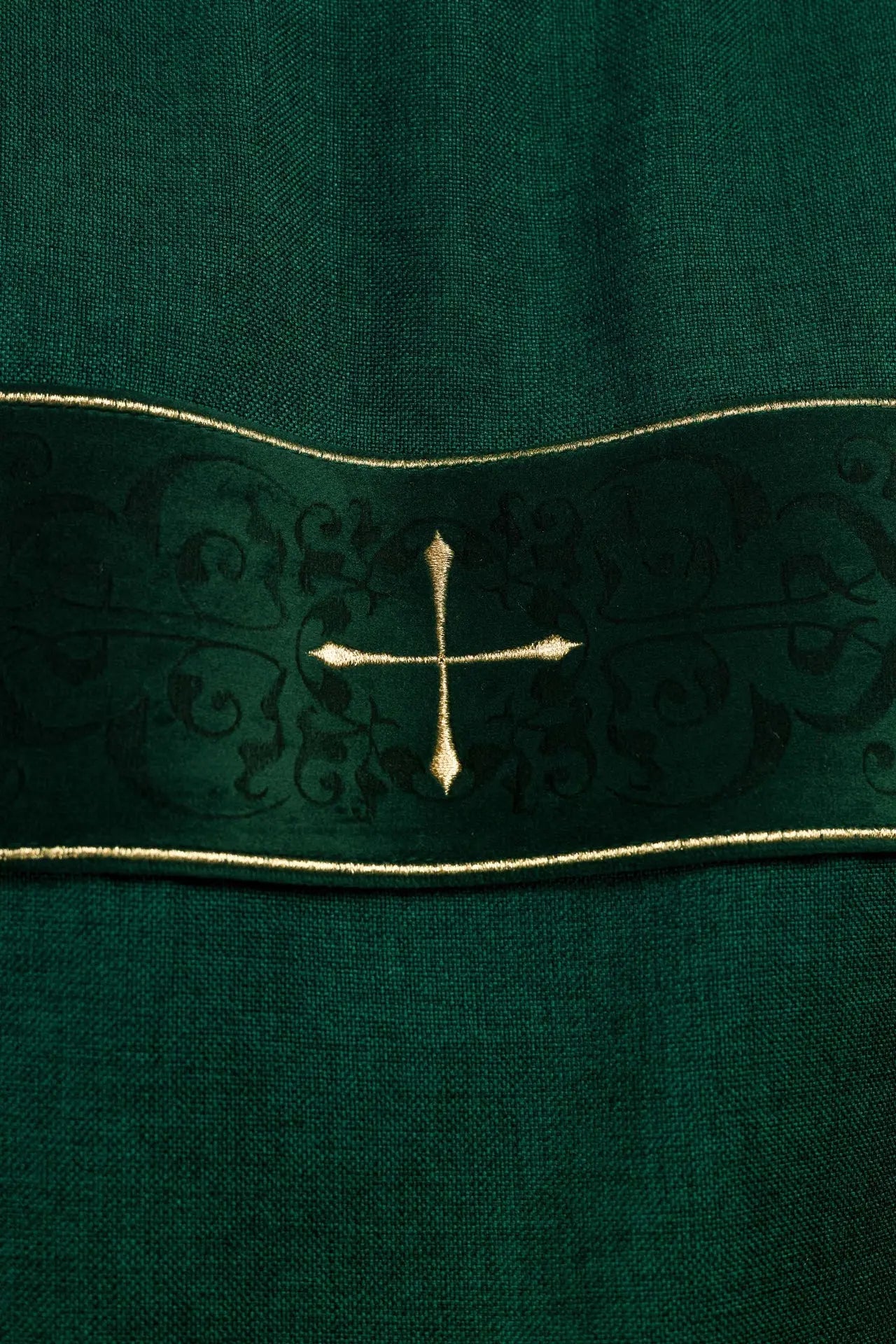 Green dalmatic with velvet stripes and embroidered gold crosses
