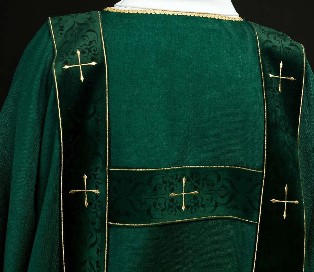 Green dalmatic with velvet stripes and embroidered gold crosses