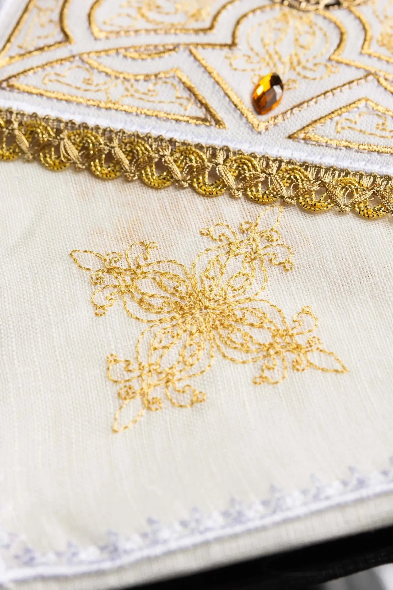 Richly decorated embroidered chalice linen