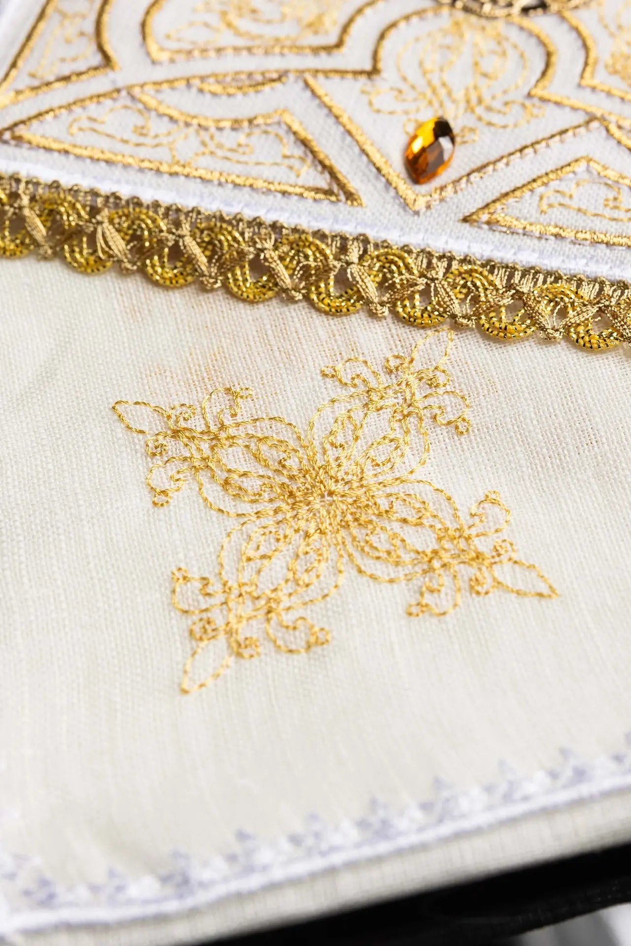 Richly decorated embroidered chalice linen
