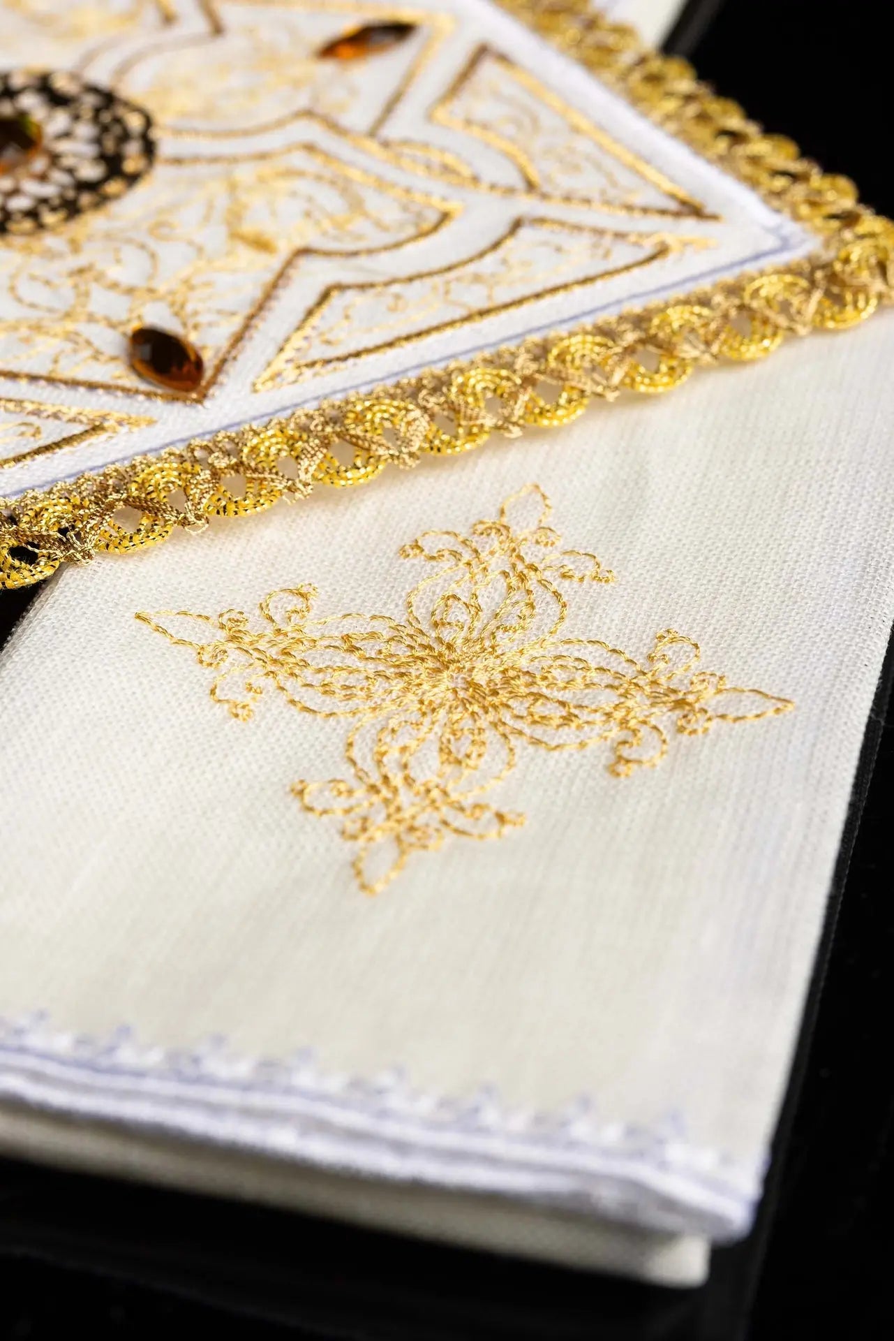 Richly decorated embroidered chalice linen