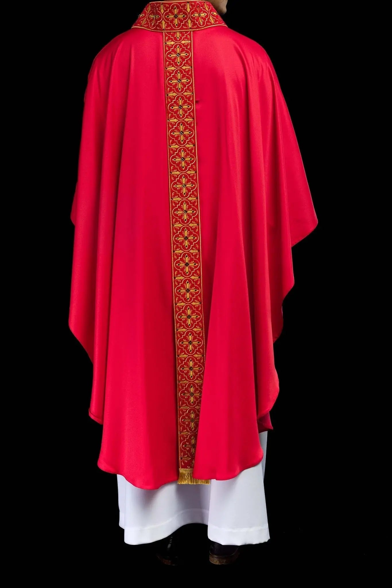 Chasuble richly embroidered decorated with red stones