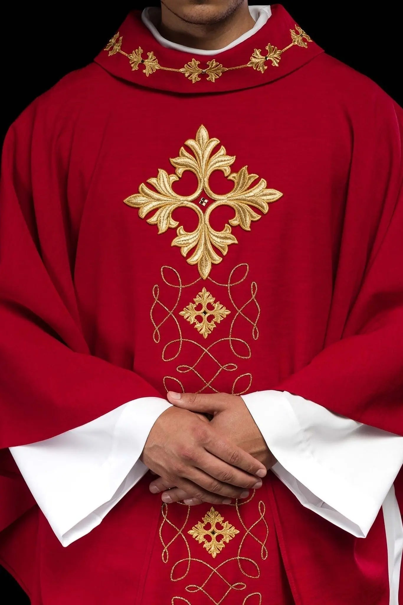 Red chasuble richly embroidered with rope and stones