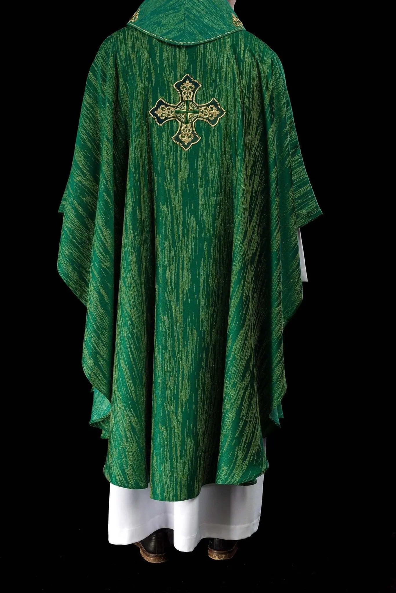 Green chasuble with richly embroidered cross and d