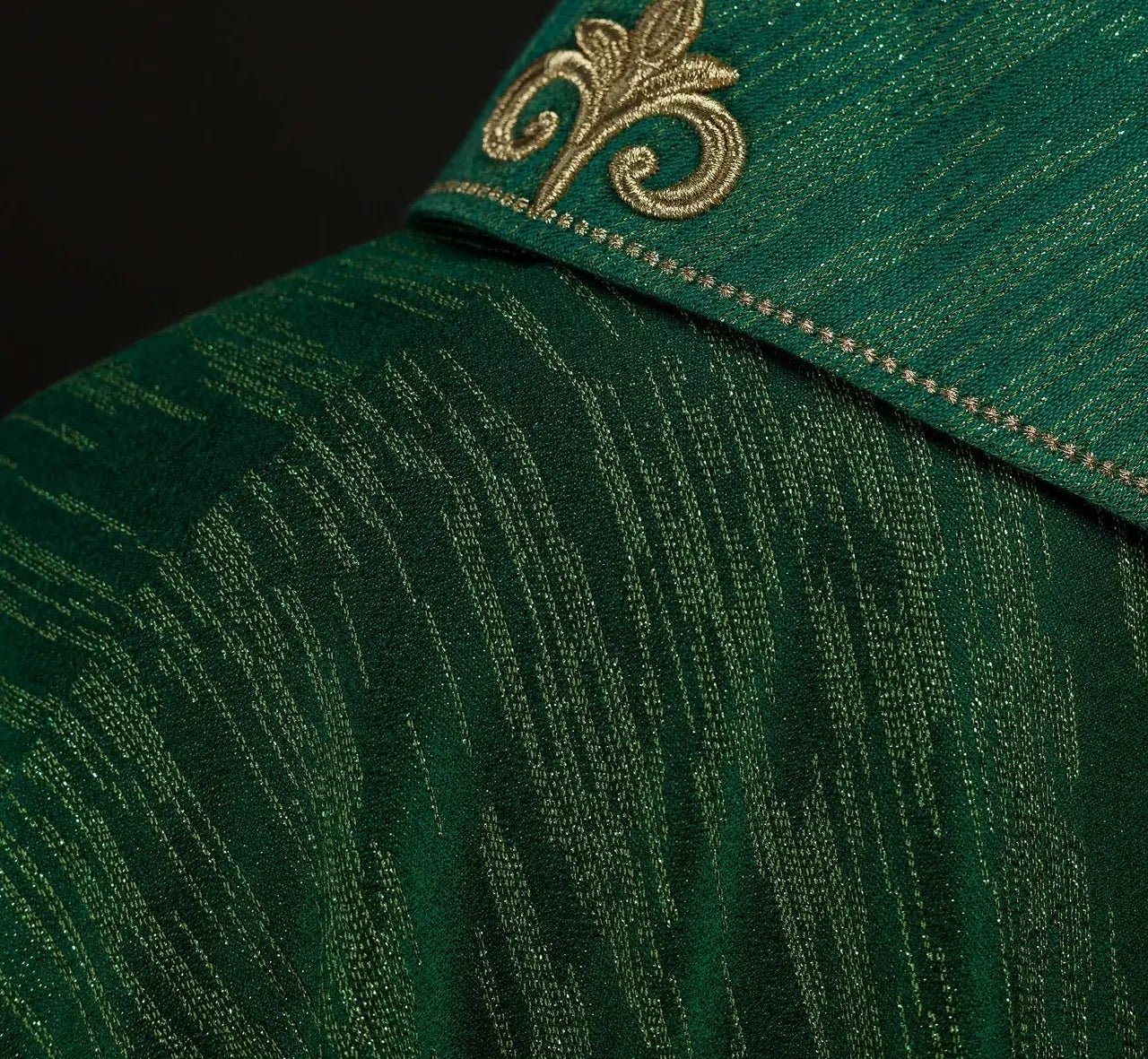 Green chasuble with richly embroidered cross and decorated collar