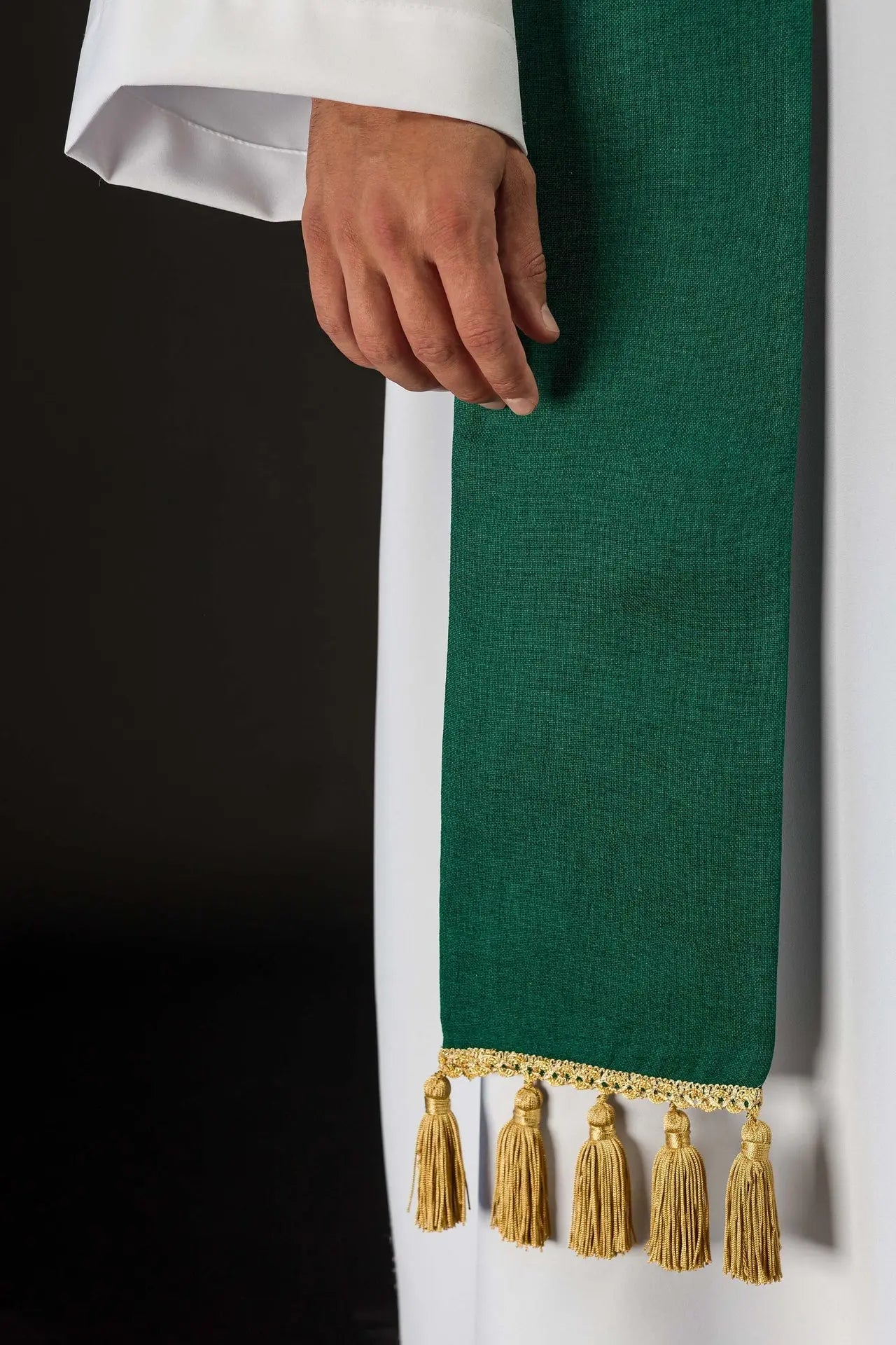 Green stole embroidered with the IHS motif