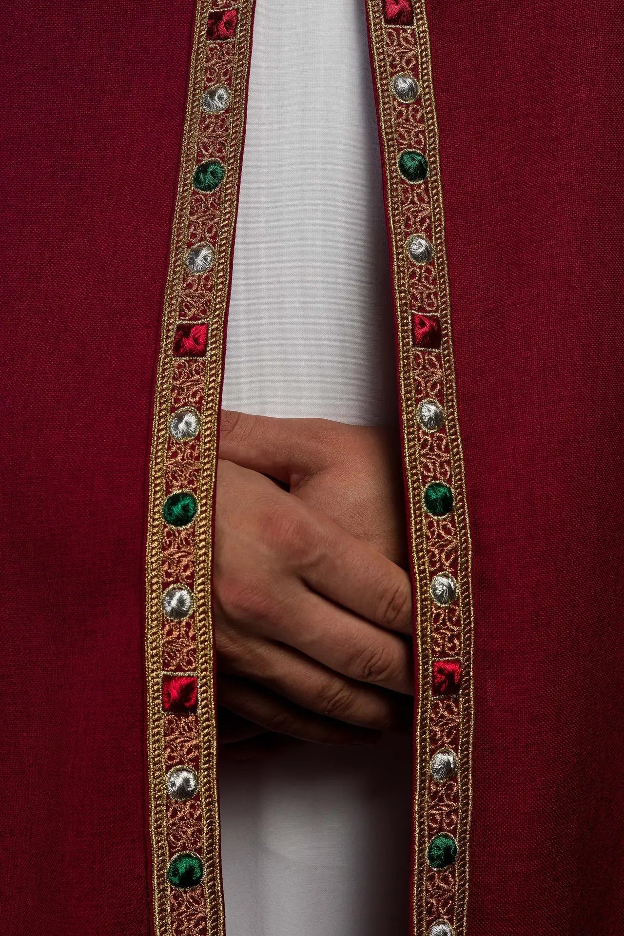 Red liturgical cape with gold IHS