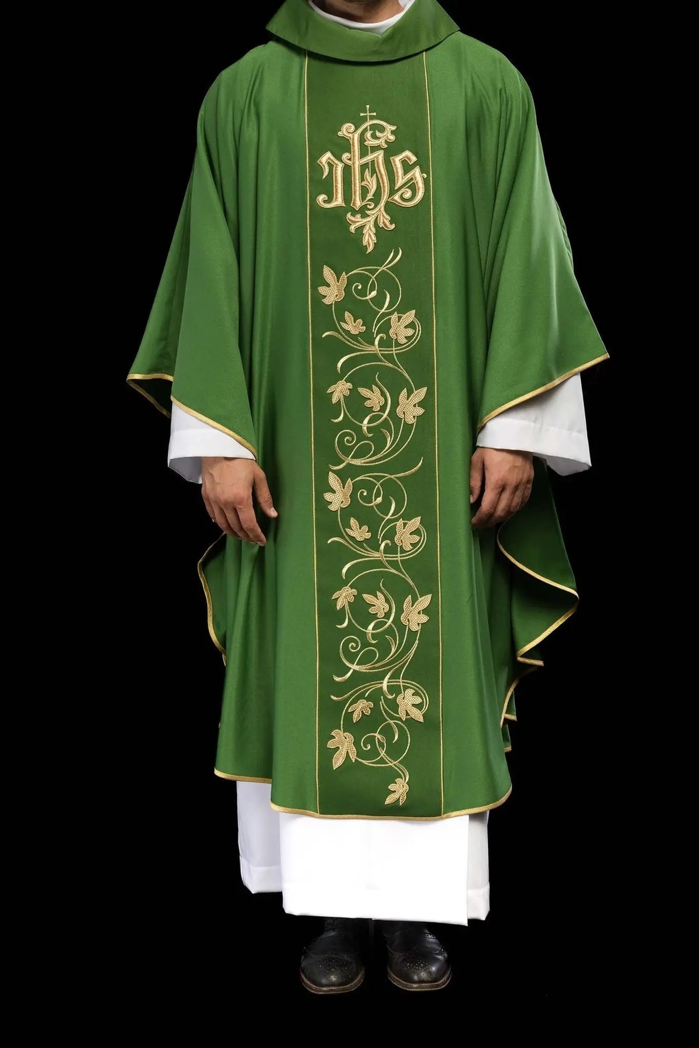 Green liturgical chasuble with richly decorated belt with floral motif and IHS