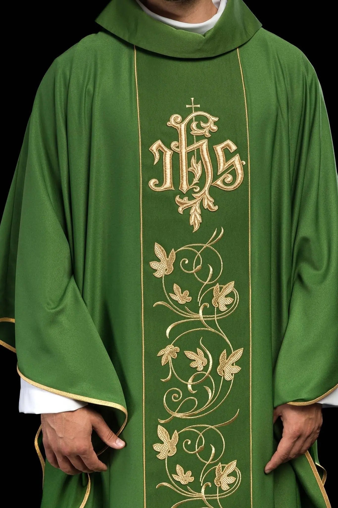 Green liturgical chasuble with richly decorated belt with floral motif and IHS