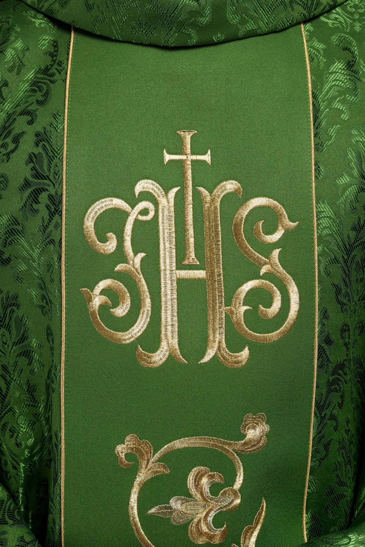 Green liturgical chasuble with richly decorated IHS belt