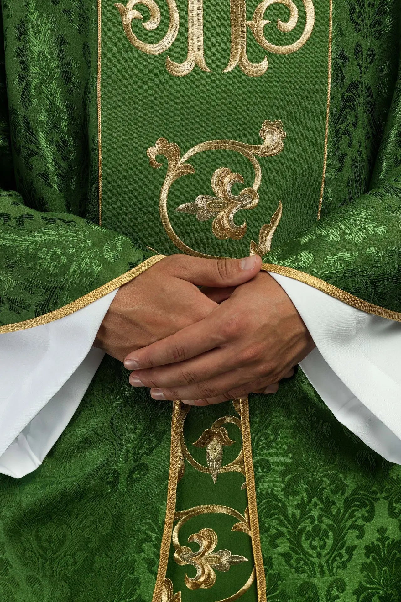 Green liturgical chasuble with richly decorated IHS belt