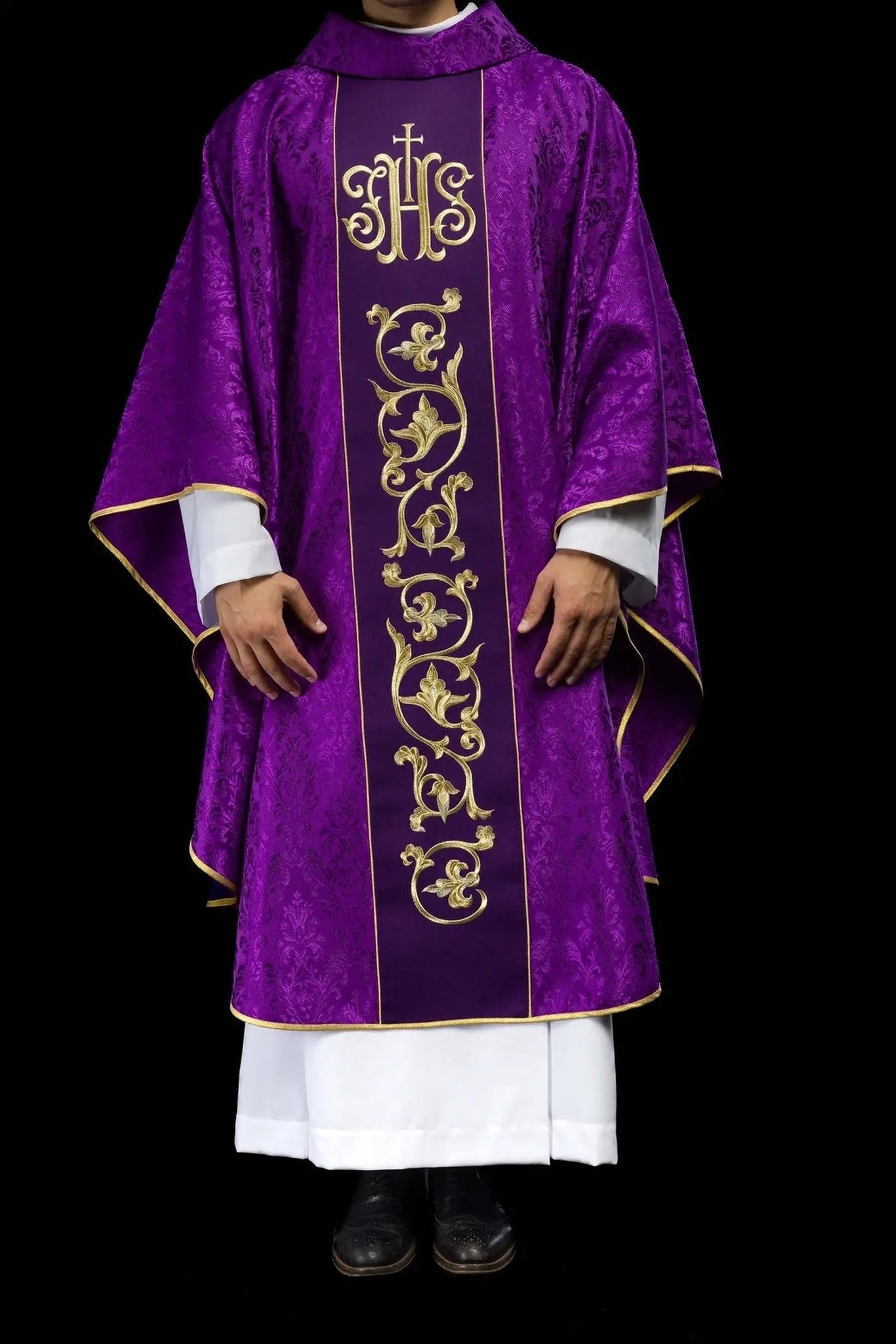 Purple liturgical chasuble with richly decorated IHS belt