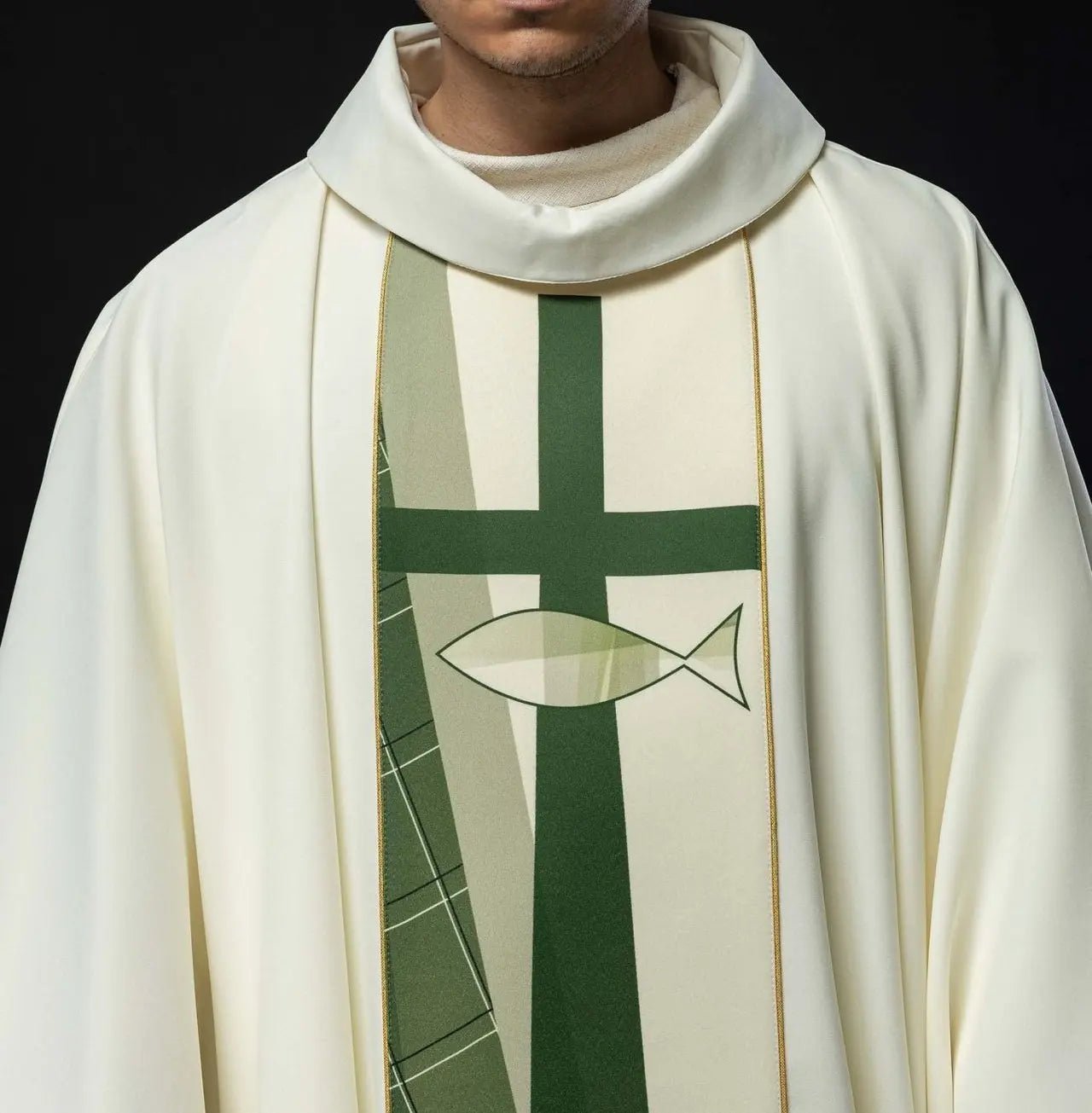 White chasuble embroidered with cross and fish pattern