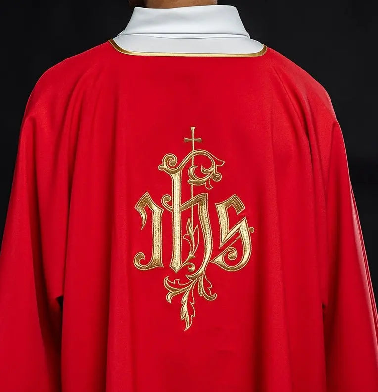 Red dalmatic with embroidered IHS design