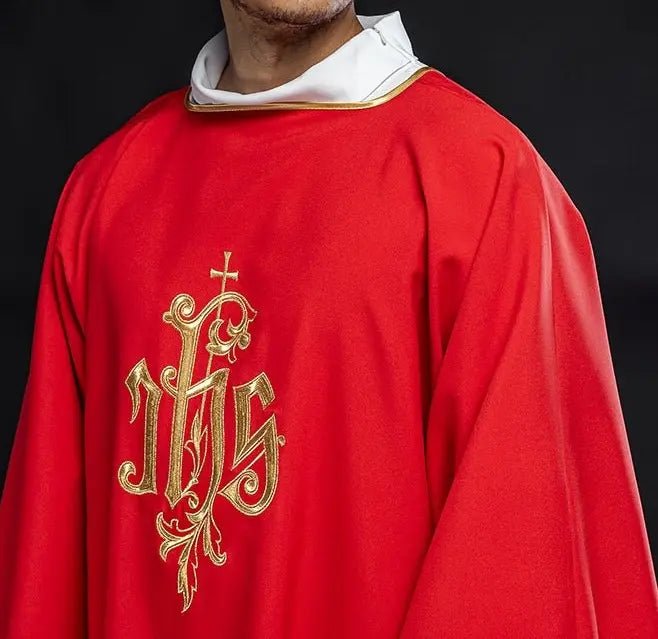 Red dalmatic with embroidered IHS design