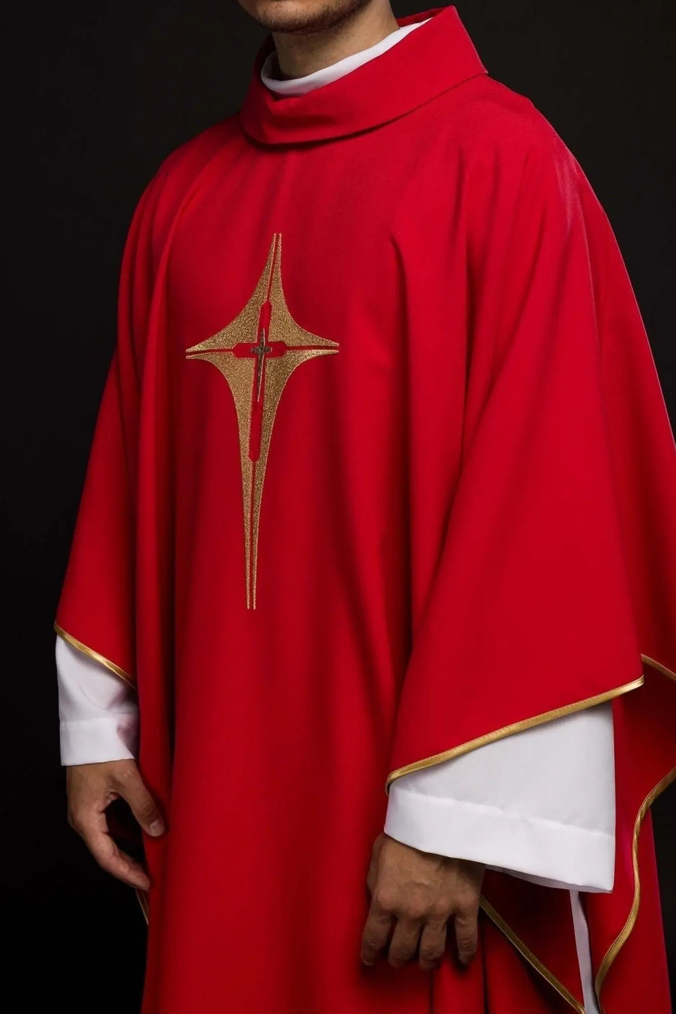 Red chasuble embroidered with cross motif