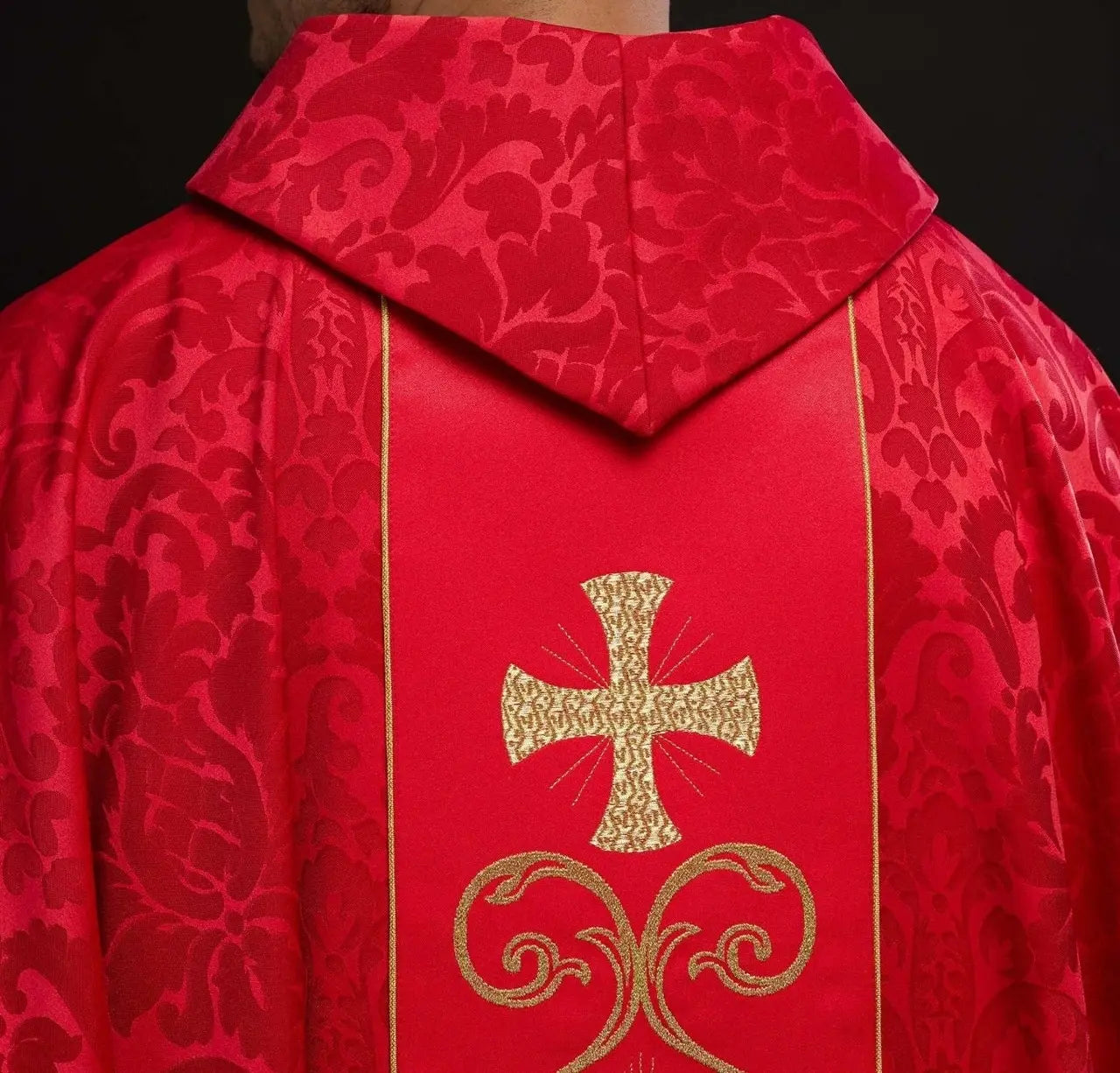Red liturgical chasuble decorated with embroidered belt